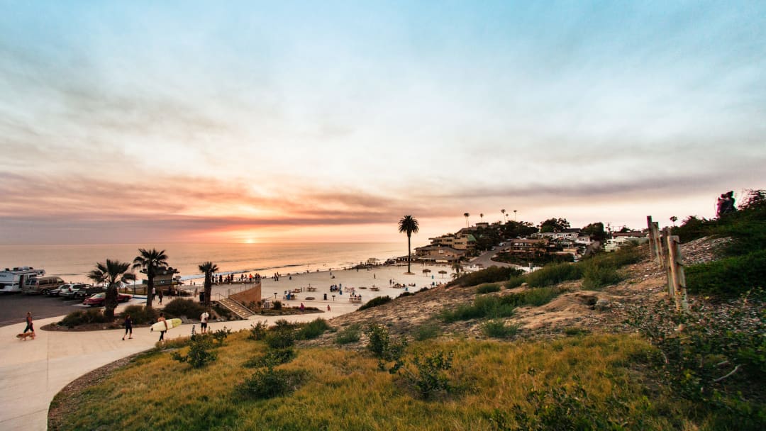 Image of a beach in San Diego at sunset. 