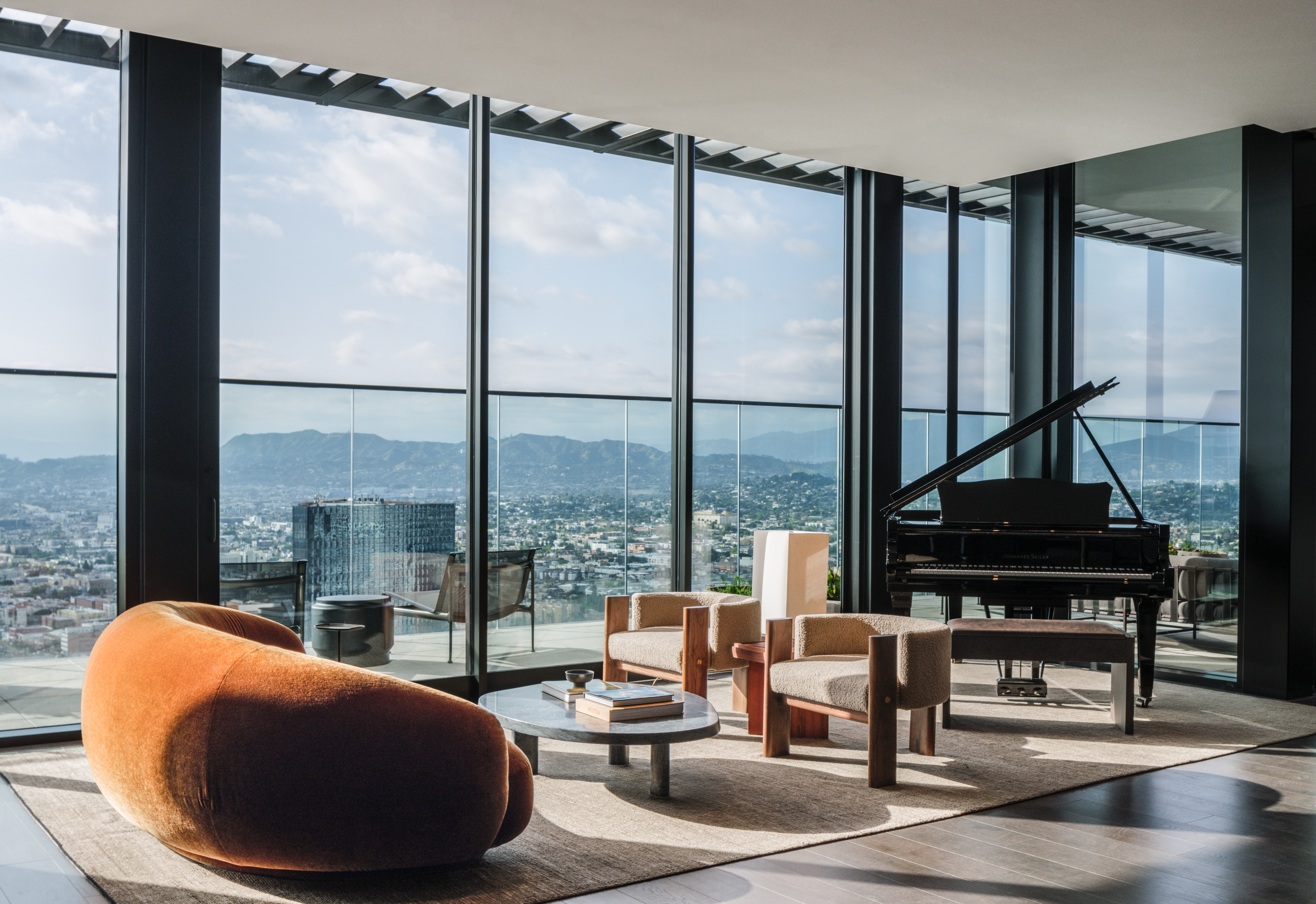 Sky lounge, views, piano, sofa, floor to ceiling windows