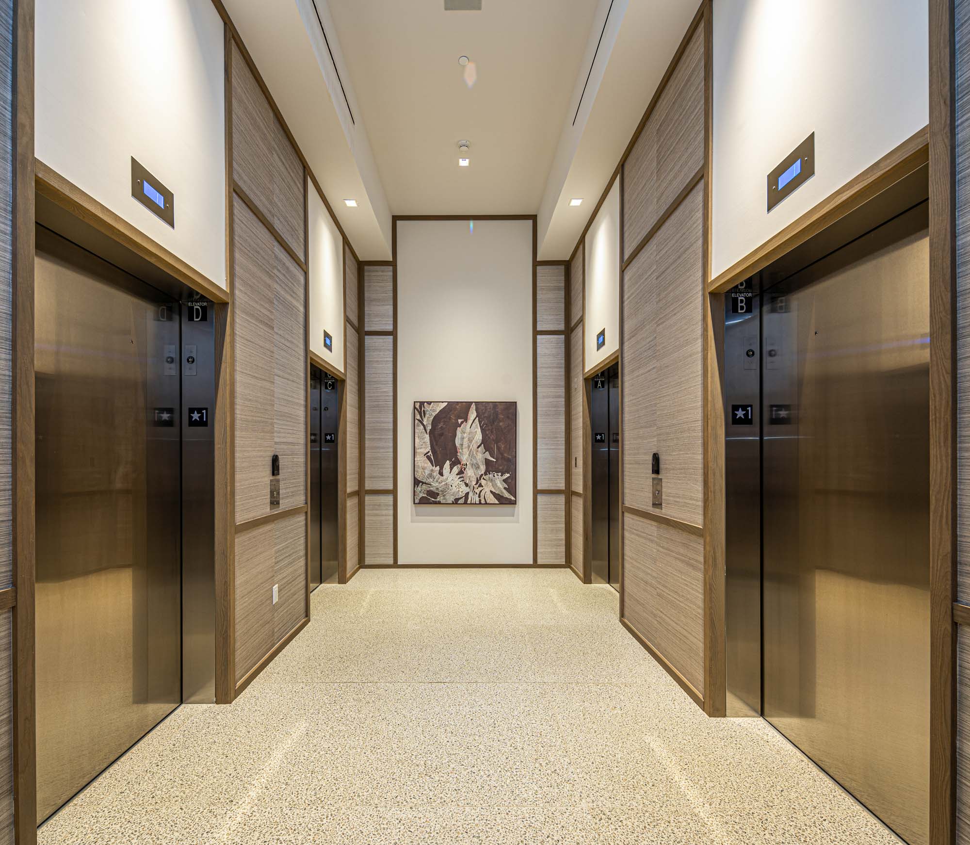 A modern lobby with elevators.