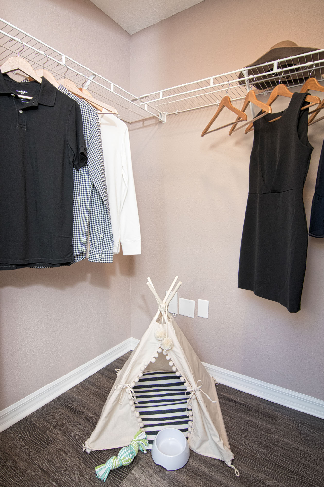 A walk-in closet at Solano at Miramar apartments in Miramar, FL.