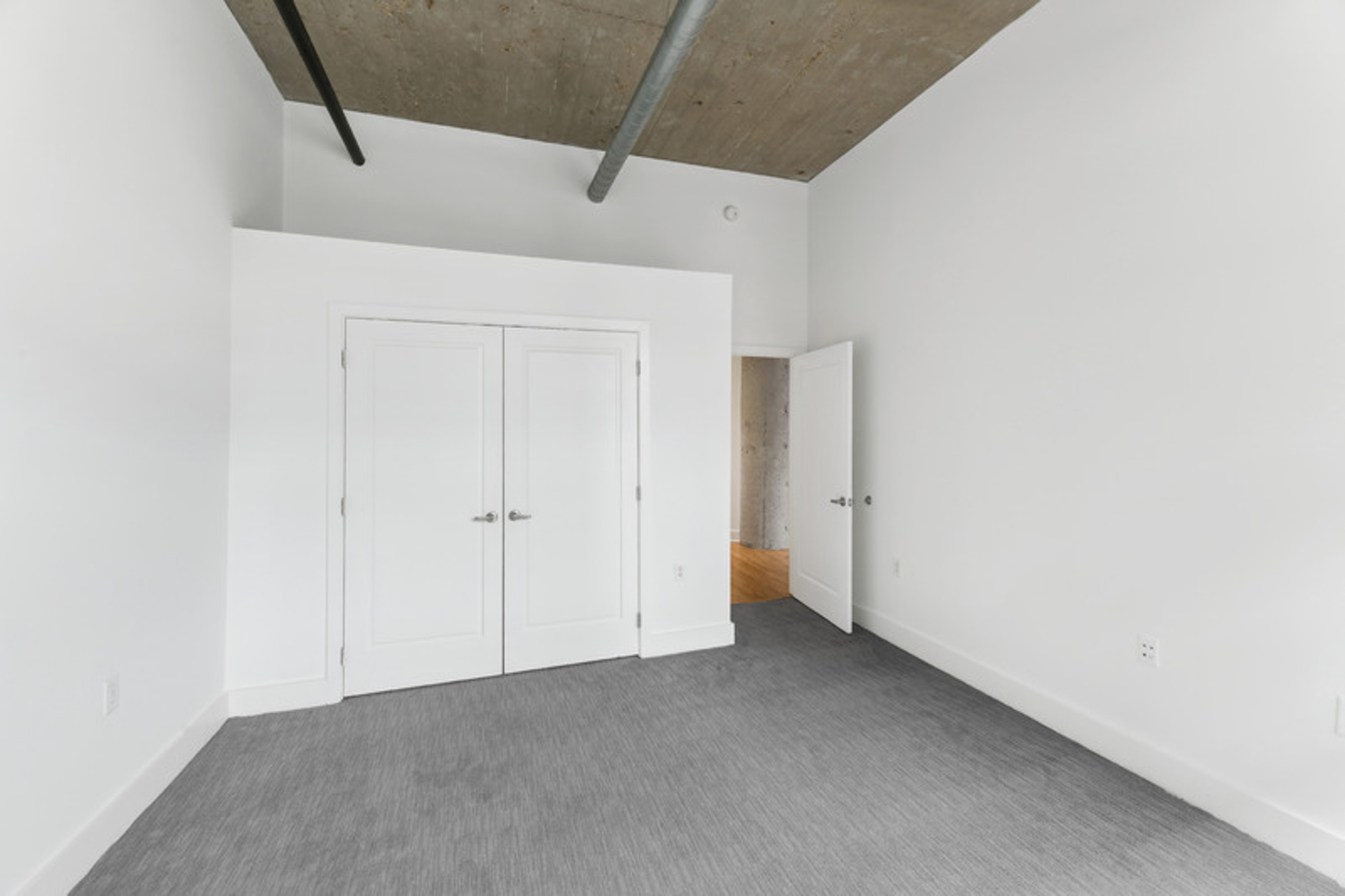 The bedroom in a Foundry Lofts apartment in Washington, D.C.