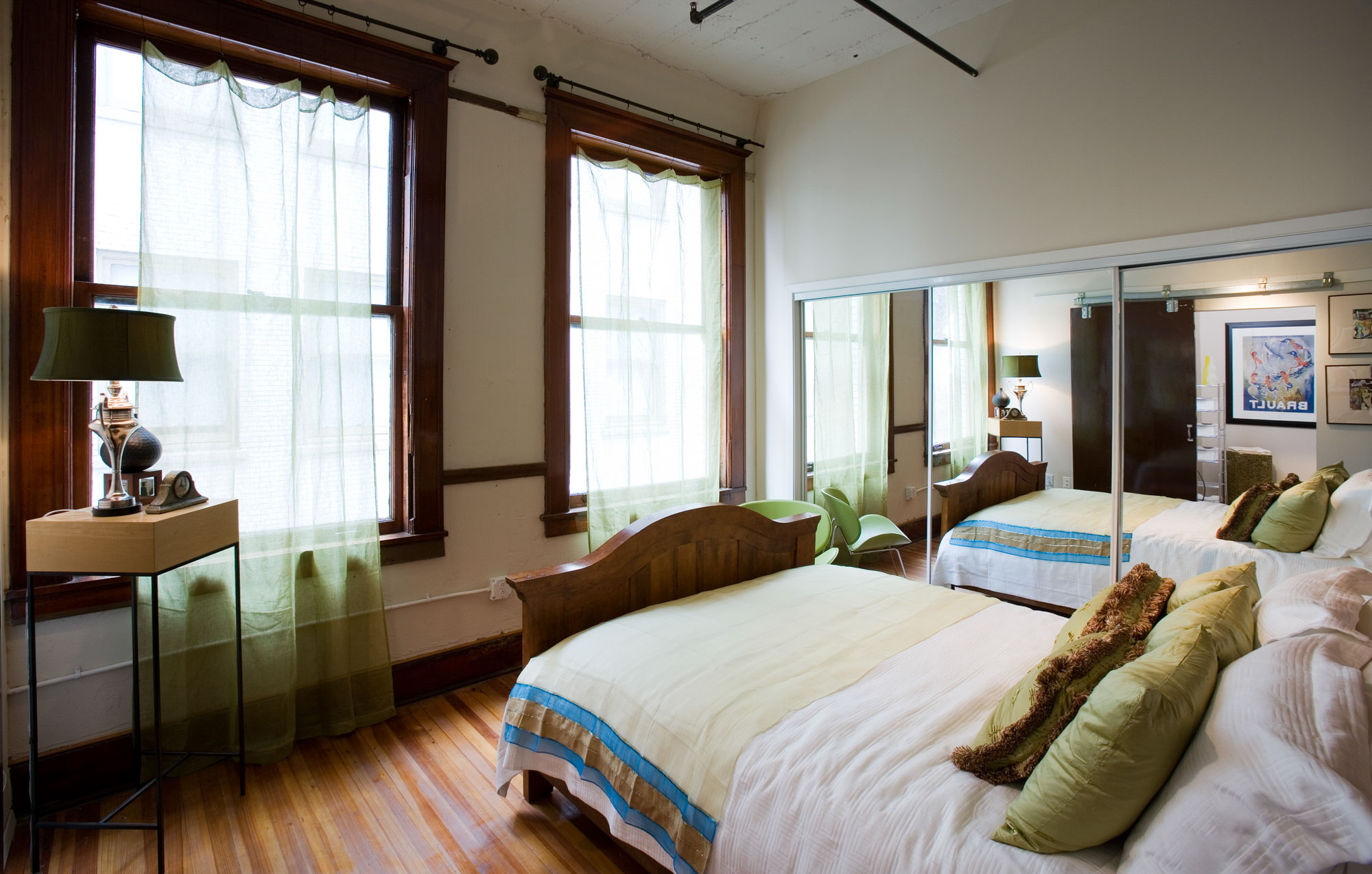 A bedroom at The Wilson apartments in Mercantile Place in Dallas, TX