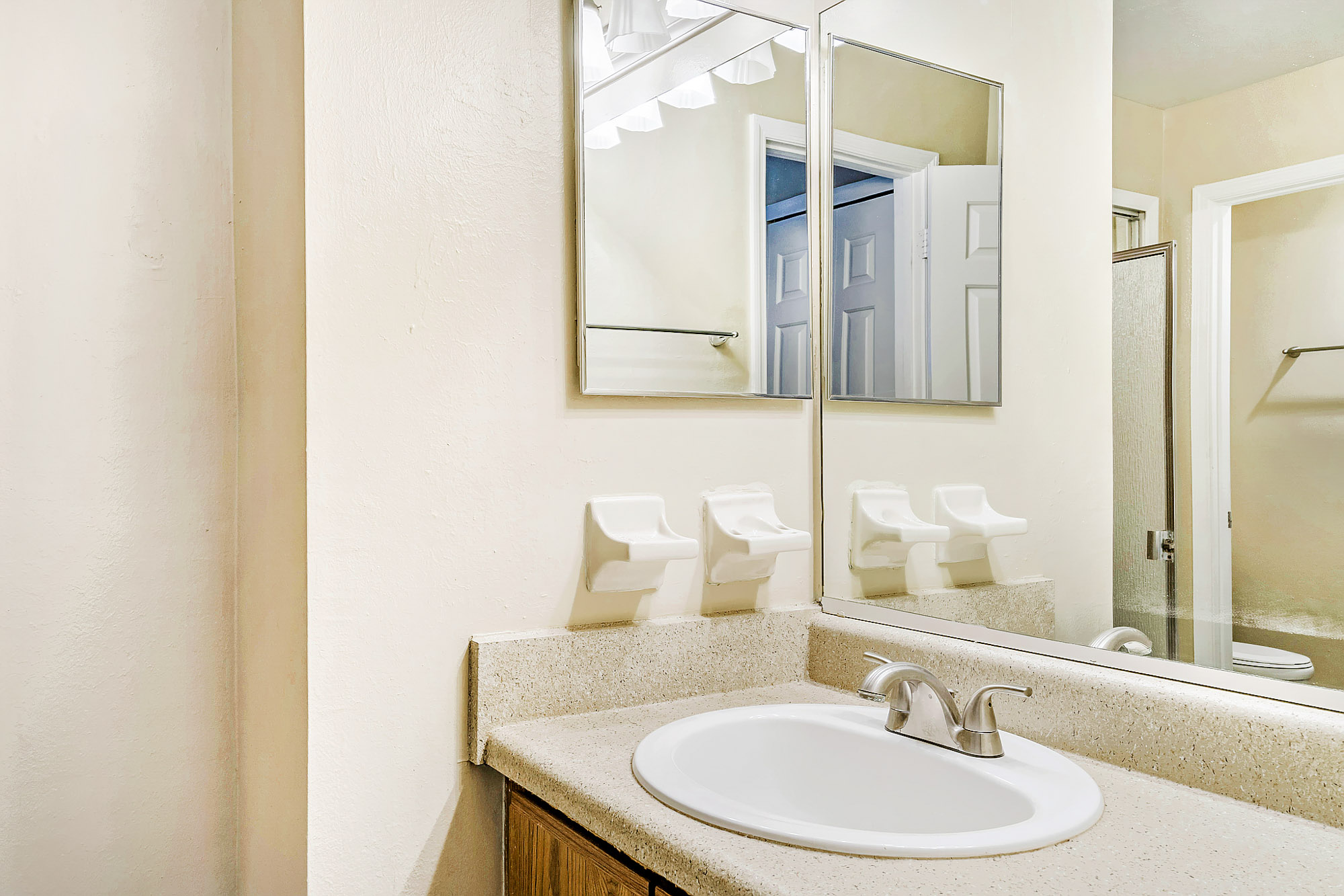 The interior of a bathroom at Oak Ramble apartments in Tampa, FL.