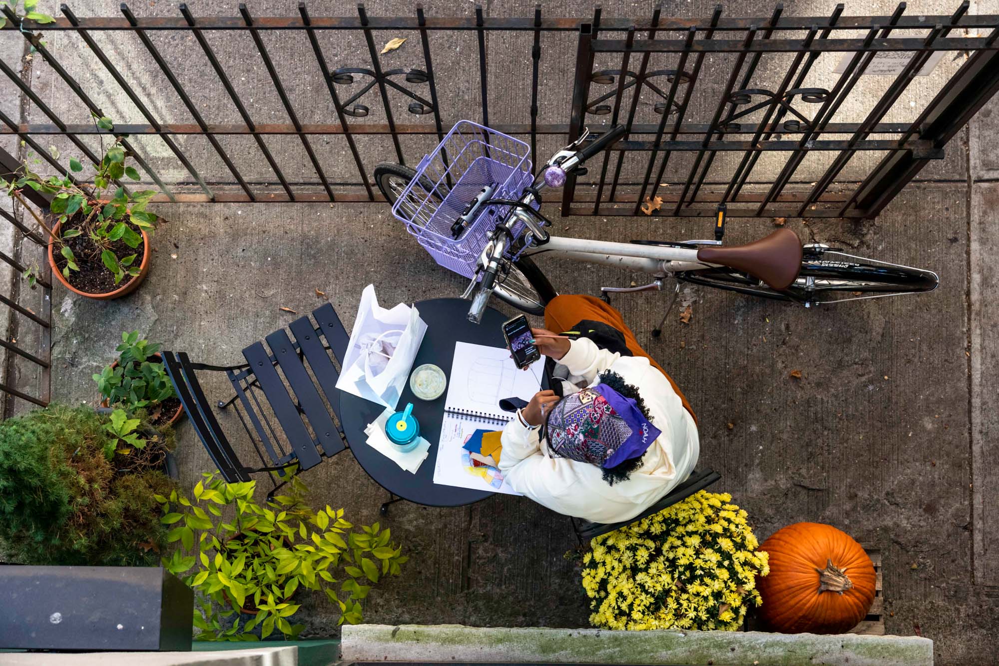 A person sitting outside near Lincoln at Bankside in the Bronx, NY.