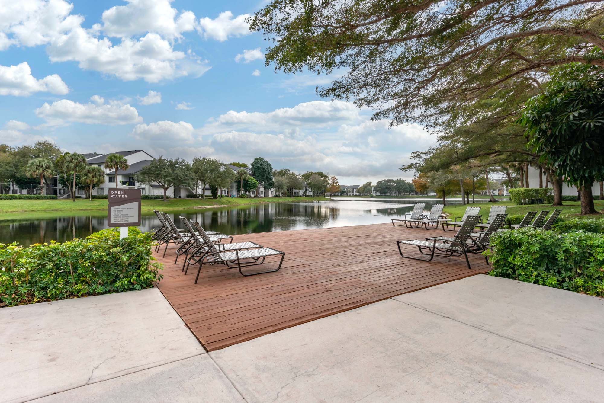 The dock on the lake at The Reserve at Ashley Lake apartments.