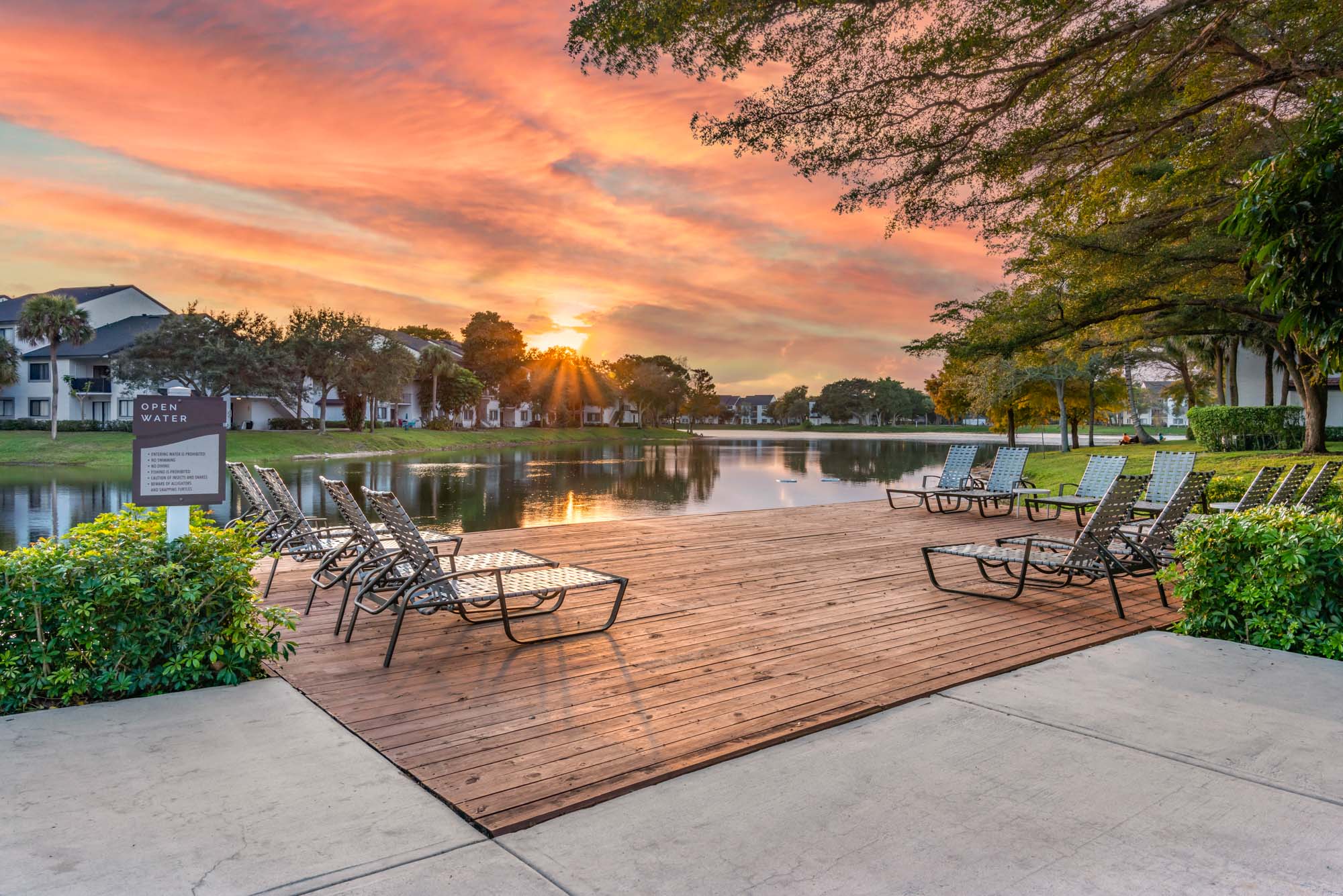 The dock on the lake at The Reserve at Ashley Lake apartments.