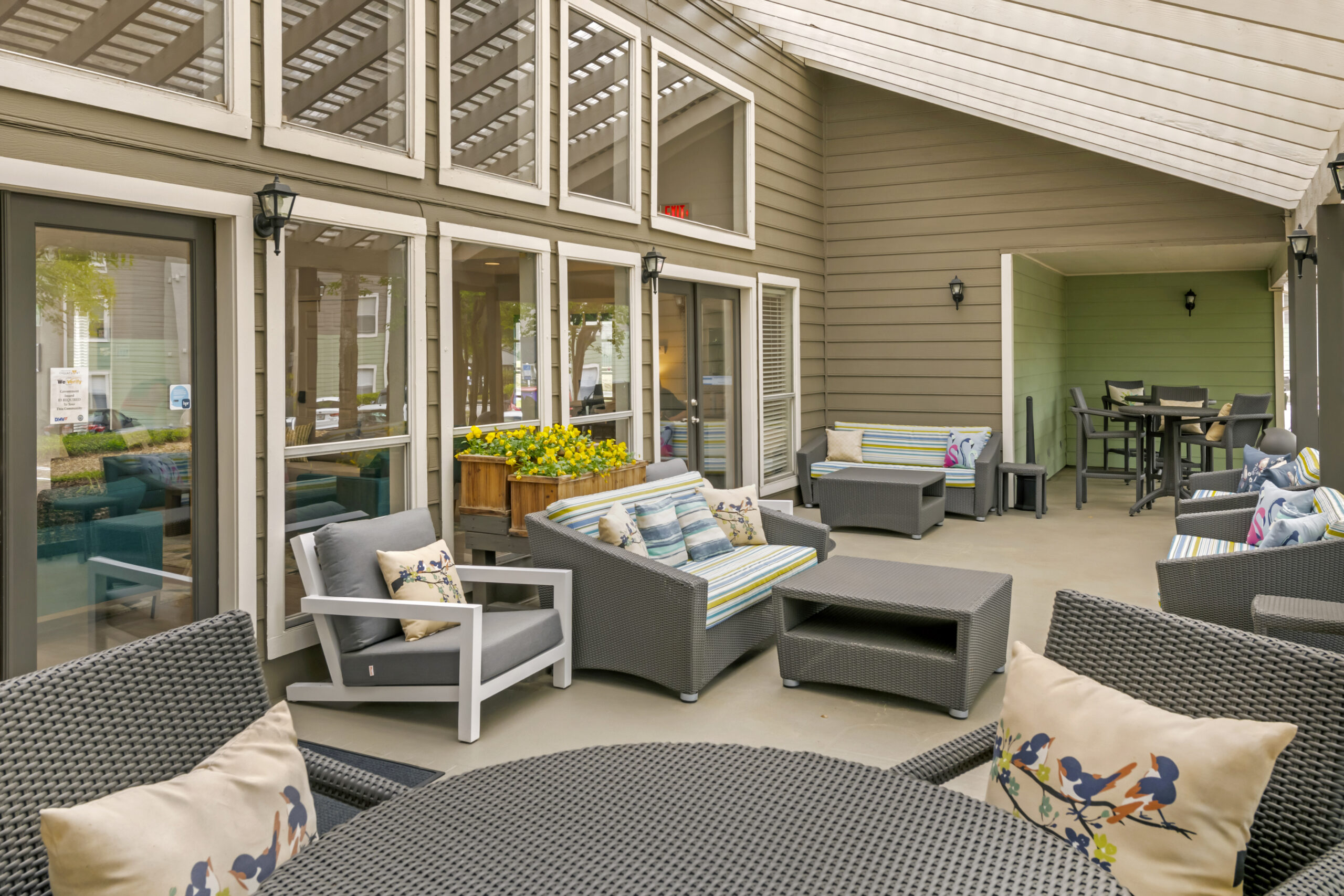 The covered veranda at Brookwood Club apartments in Jacksonville, FL.