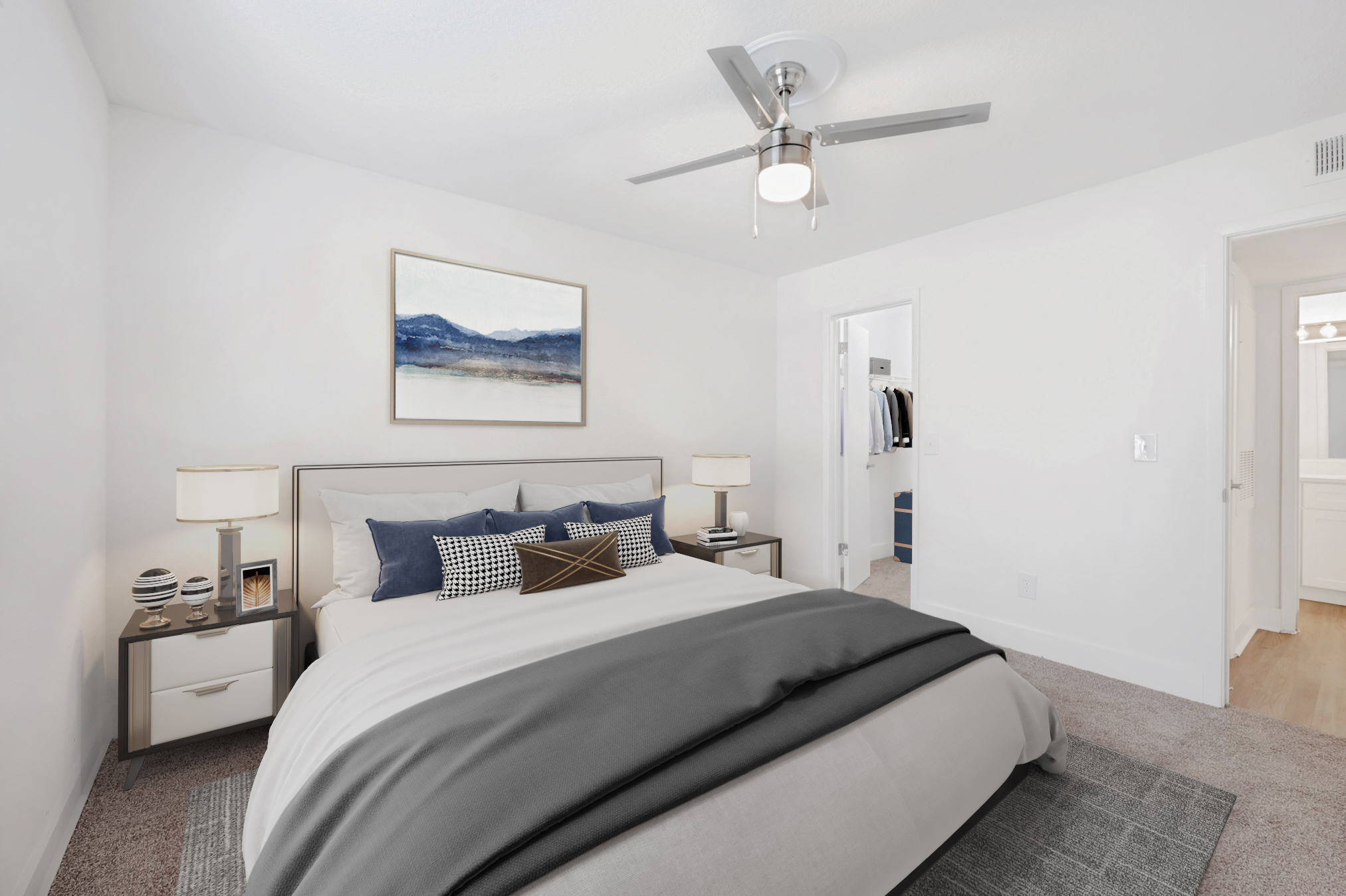 A bedroom at Brookwood Club apartments in Jacksonville, FL.