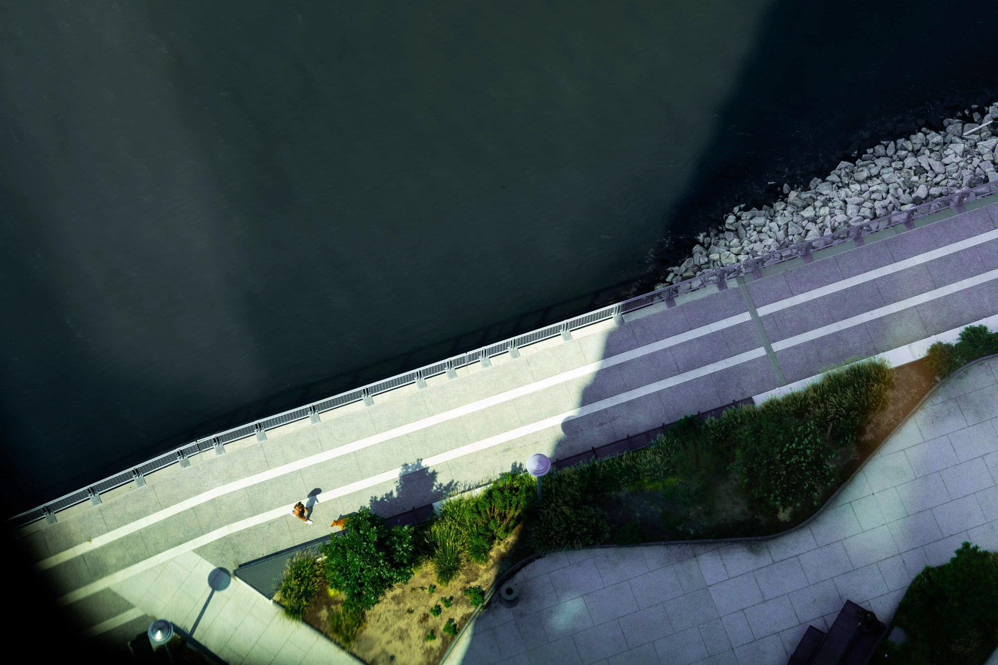 A walking and biking trail adjacent the East River in Greenpoint Landing, New York.