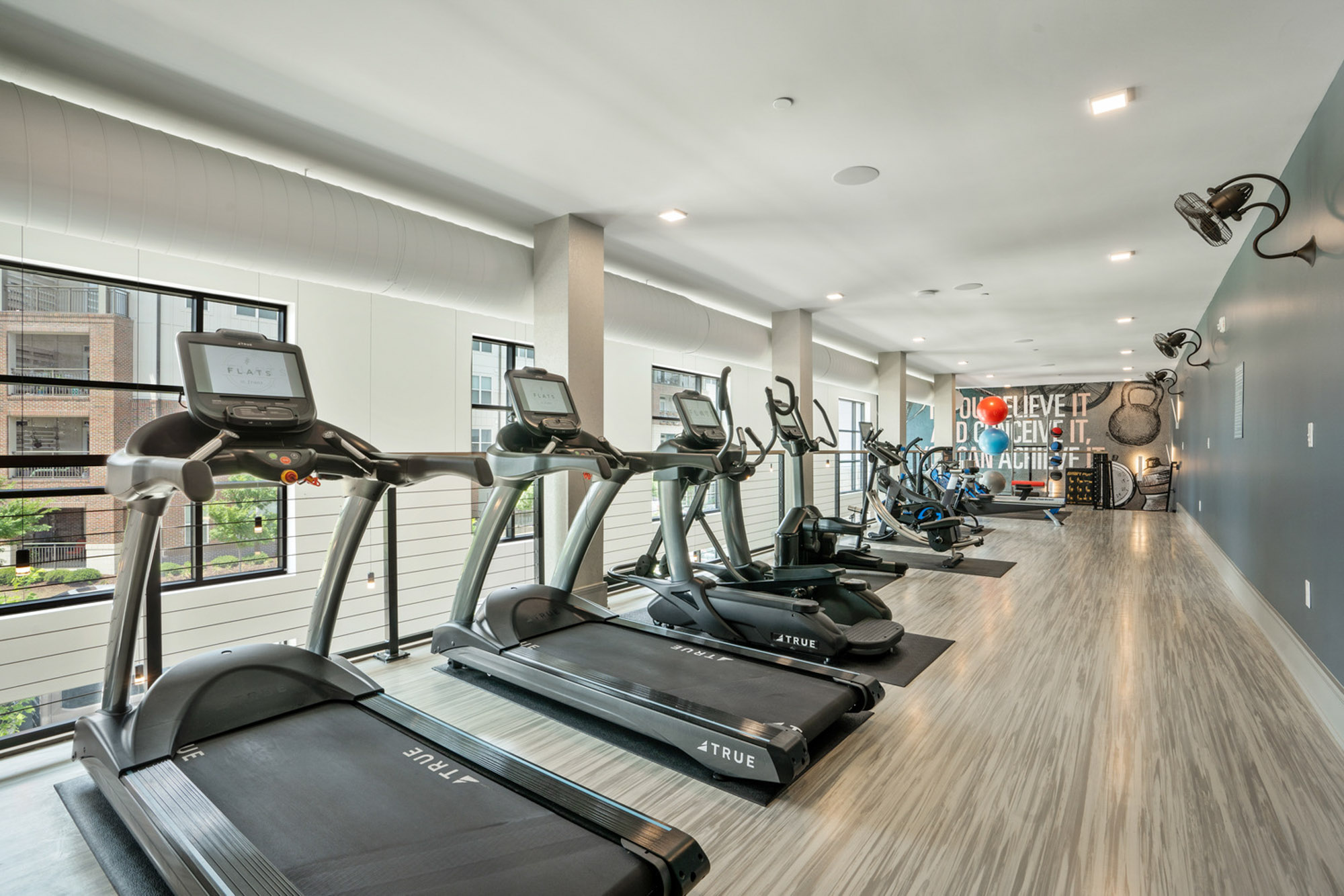 The fitness center at Flats on Front apartments in Wilmington, NC.