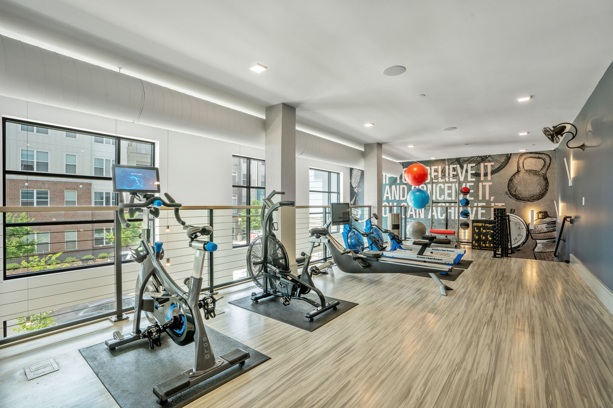 The fitness center at Flats on Front apartments in Wilmington, NC.