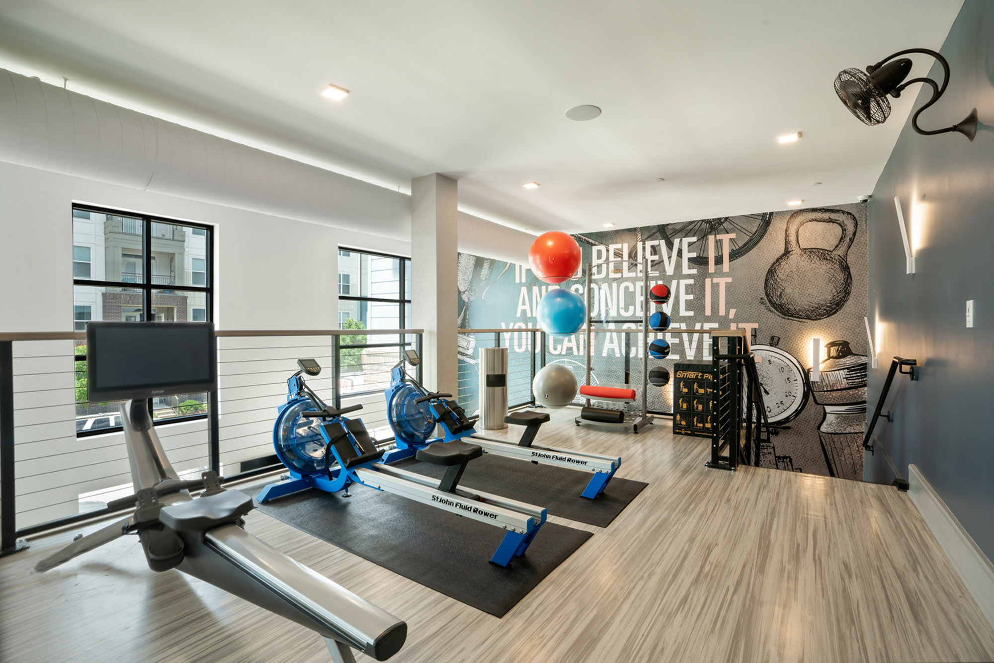 The fitness center at Flats on Front apartments in Wilmington, NC.