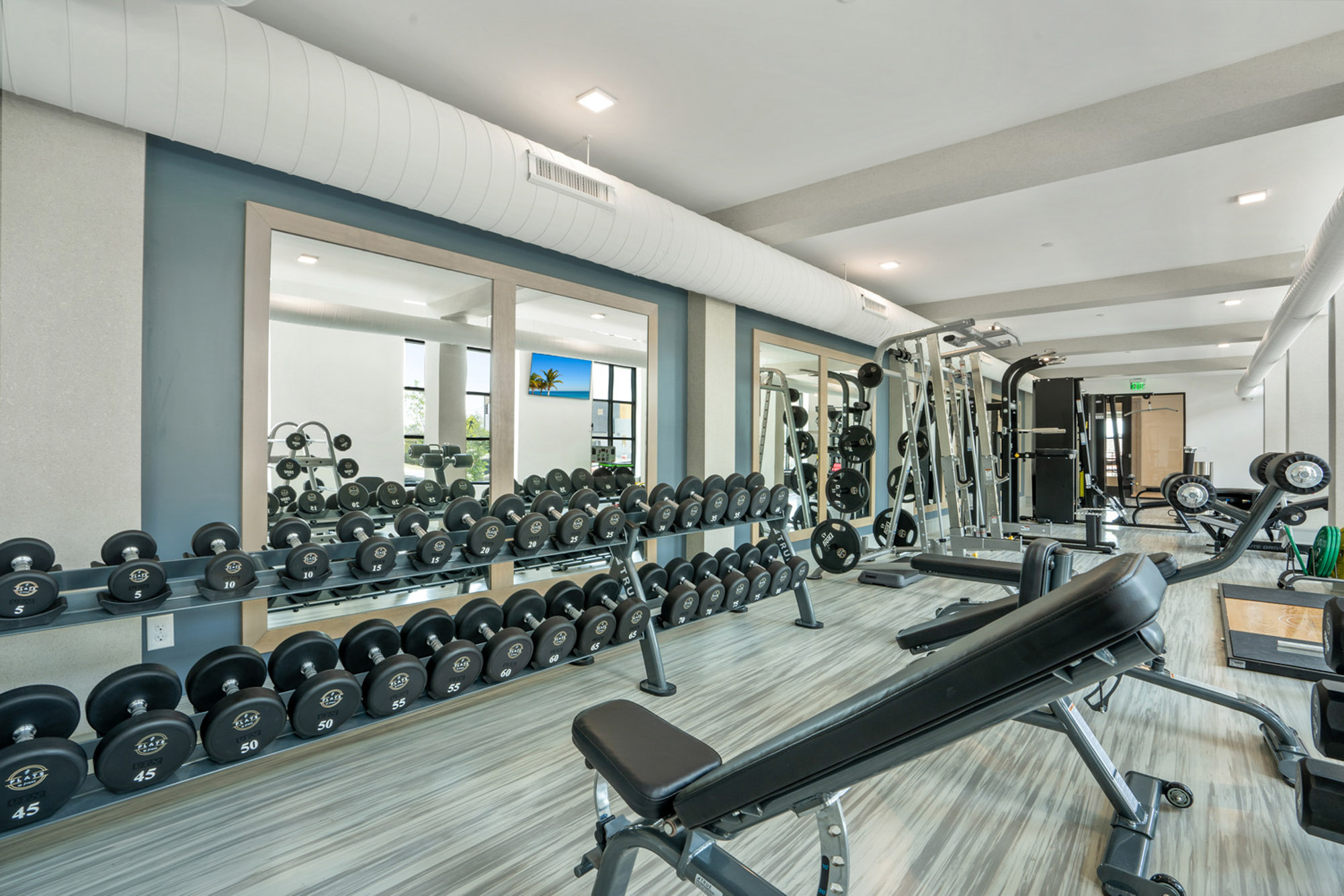 The fitness center at Flats on Front apartments in Wilmington, NC.