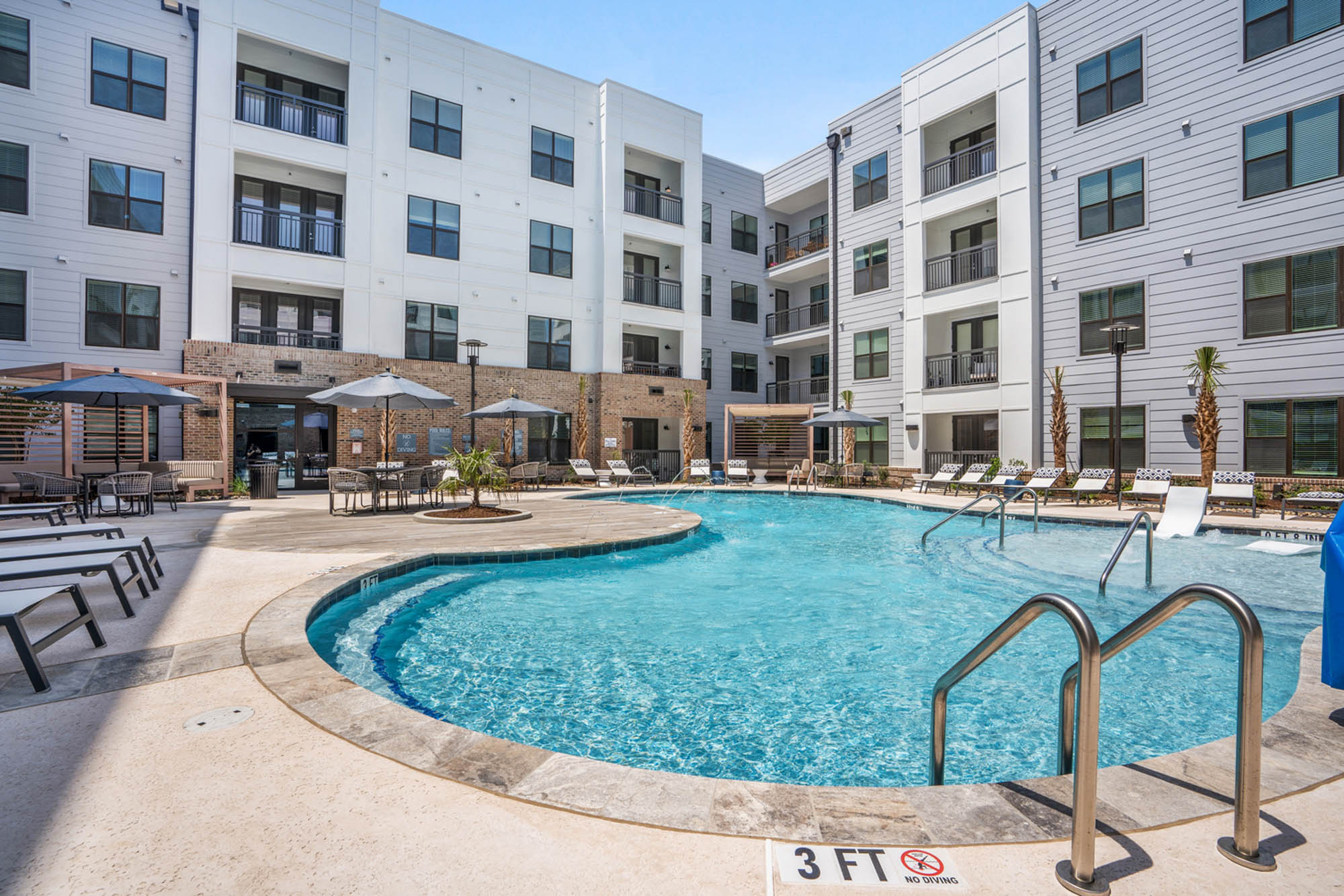 The pool area at Flats on Front apartments in Wilmington, NC.