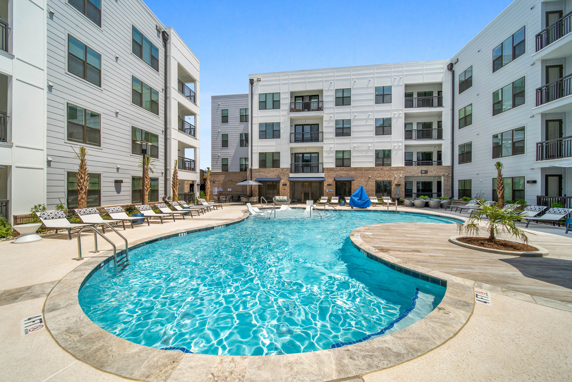 The pool at Flats on Front apartments in Wilmington, NC.