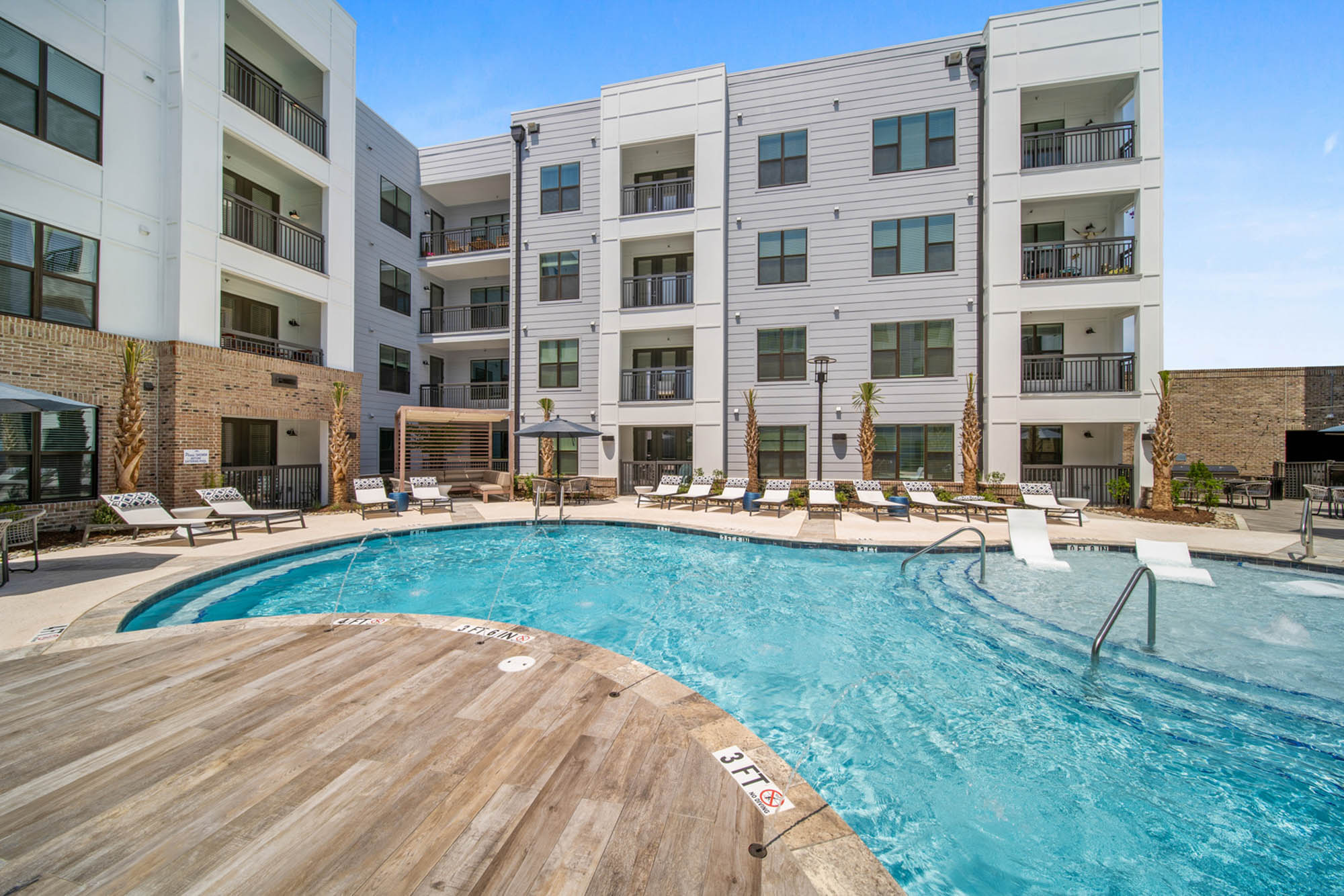 The pool at Flats on Front apartments in Wilmington, NC.