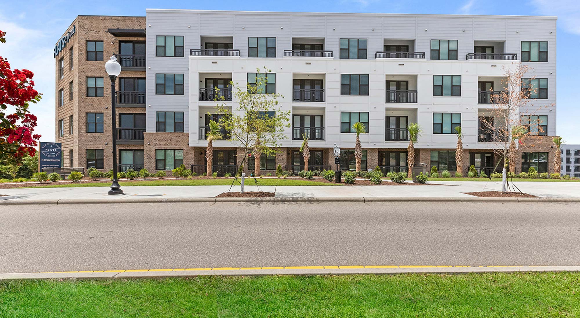 The exterior of Flats on Front apartments in Wilmington, NC.