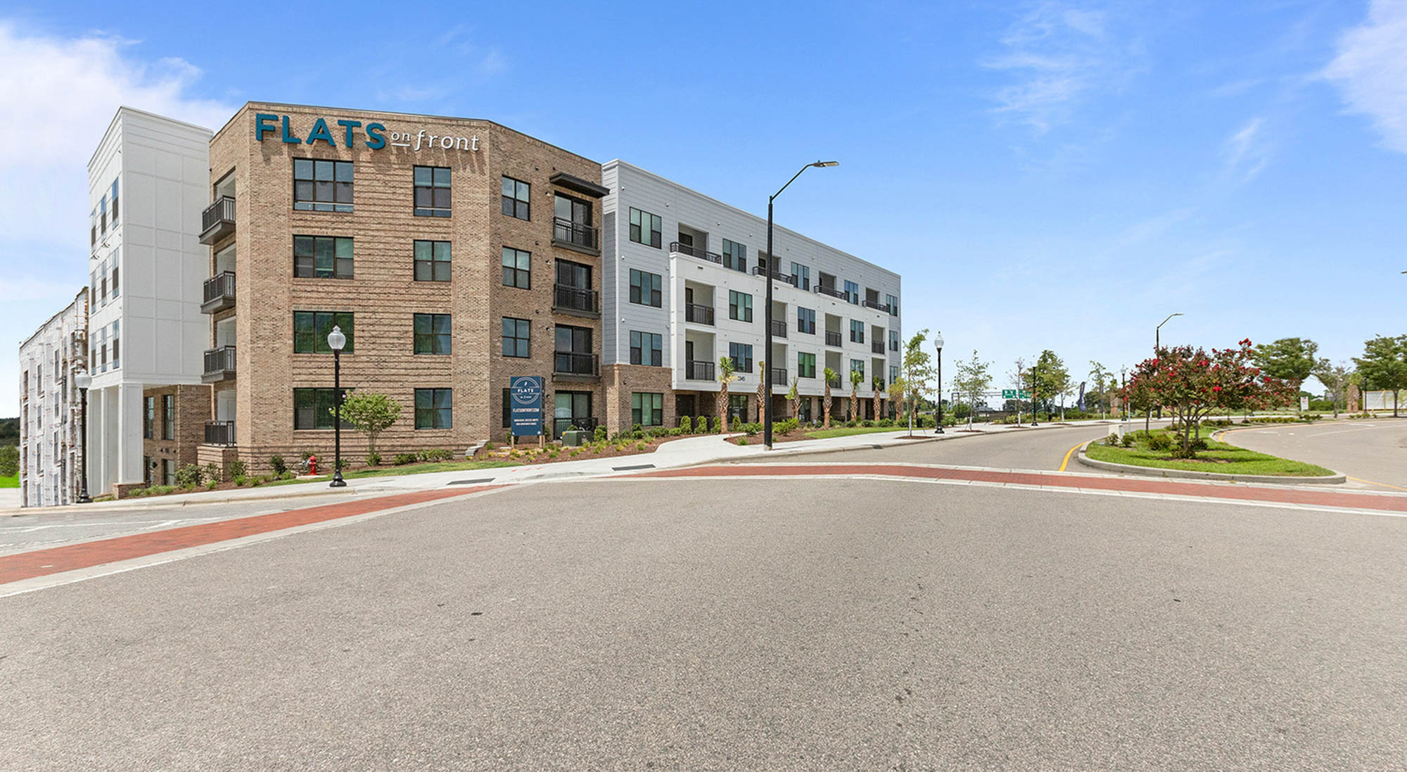 The exterior of Flats on Front apartments in Wilmington, NC.