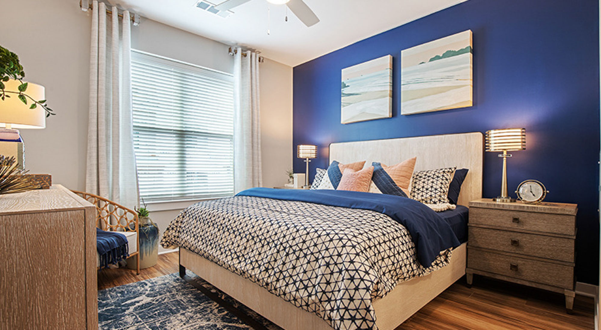 The bedroom in a Flats on Front apartment in Wilmington, NC.