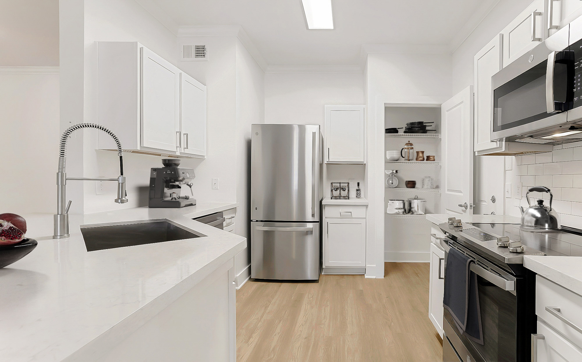 A kitchen at The Villas at Shadow Creek apartments in Houston, TX.