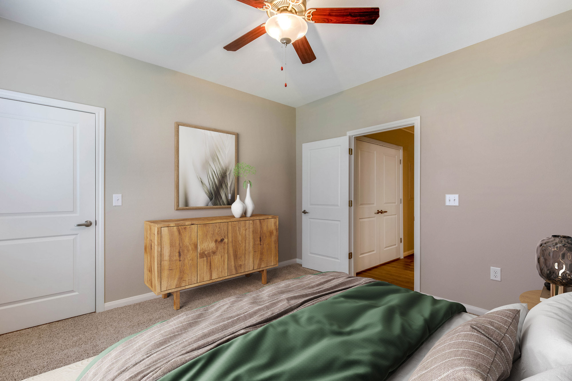 A bedroom at The Villas at Shadow Creek apartments in Houston, TX.