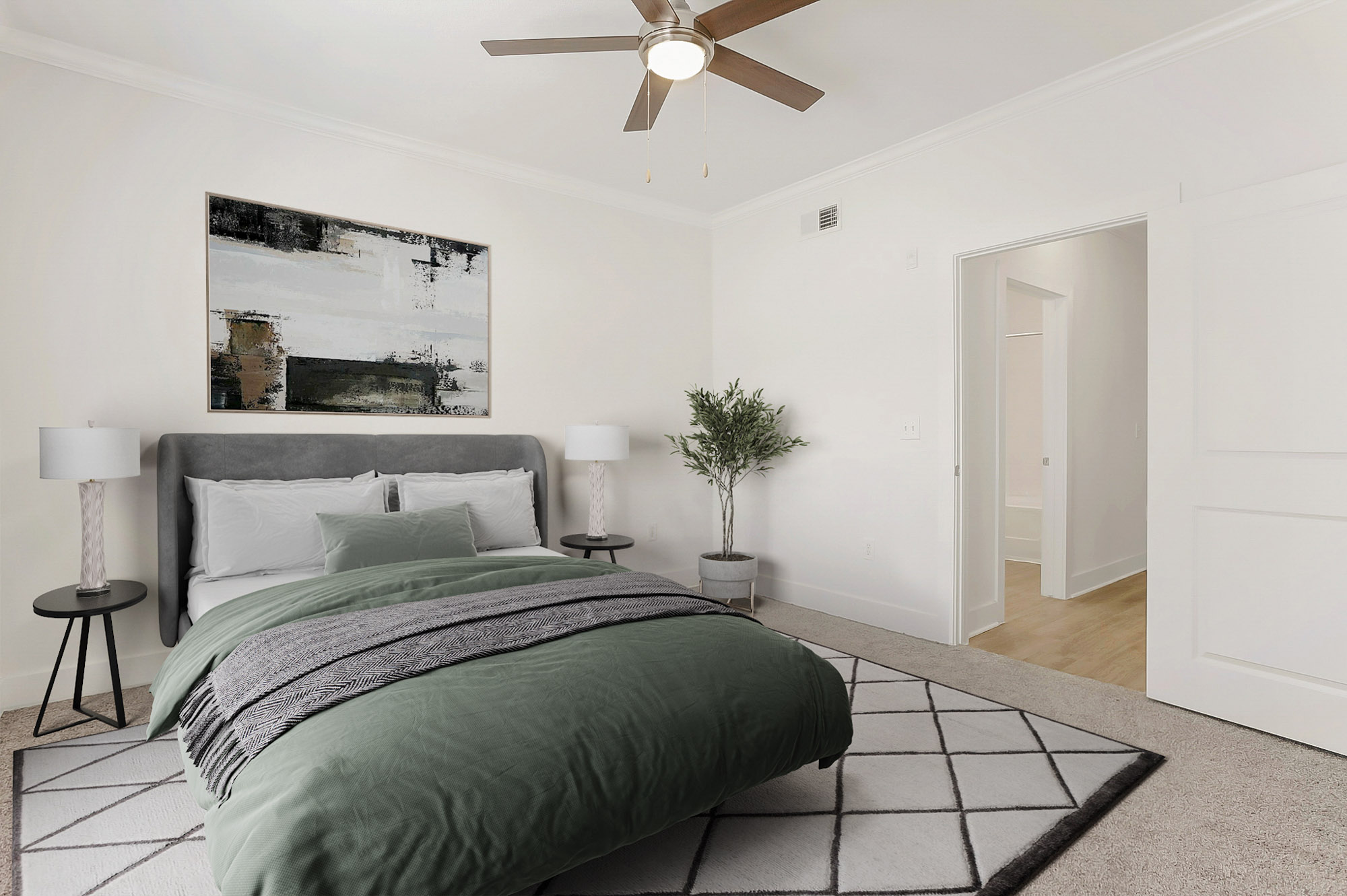 A bedroom at The Villas at Shadow Creek apartments in Houston, TX.