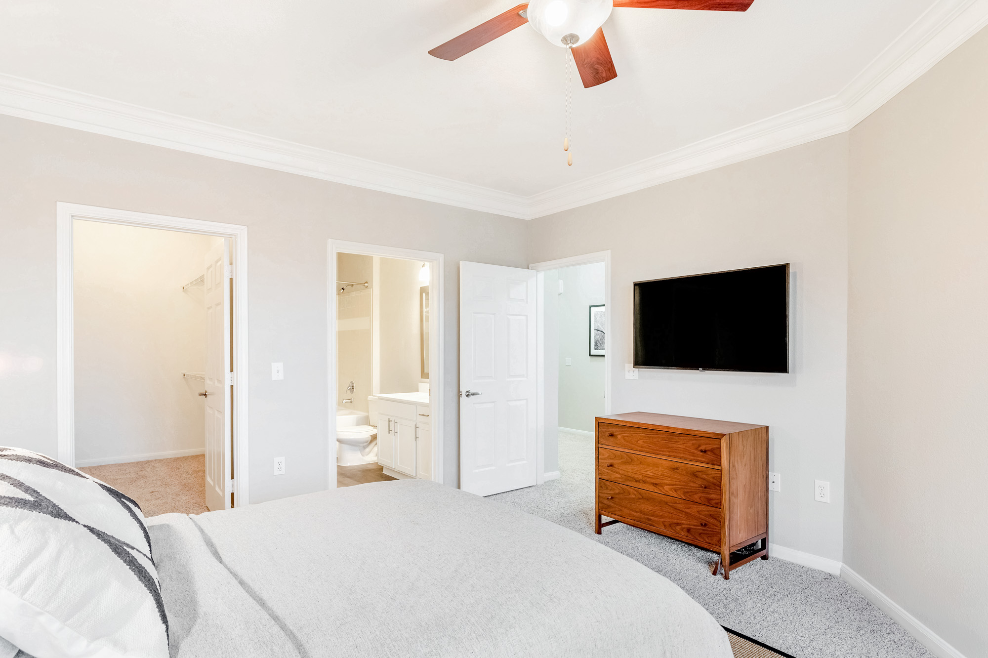 A bedroom at The Villas at Shadow Creek apartments in Houston, TX.