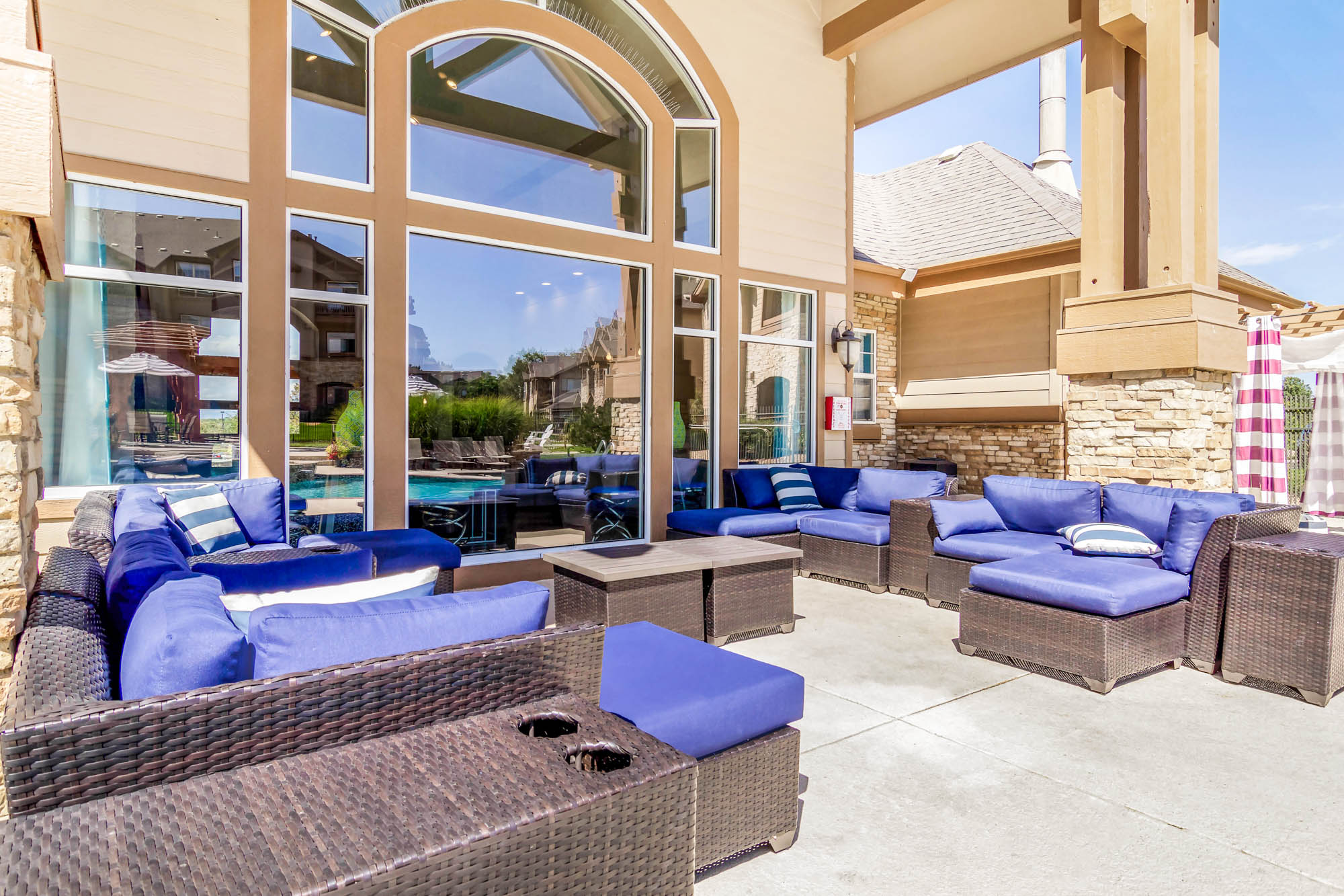 An outdoor lounge area at The Village at Legacy Ridge apartments near Denver, CO.