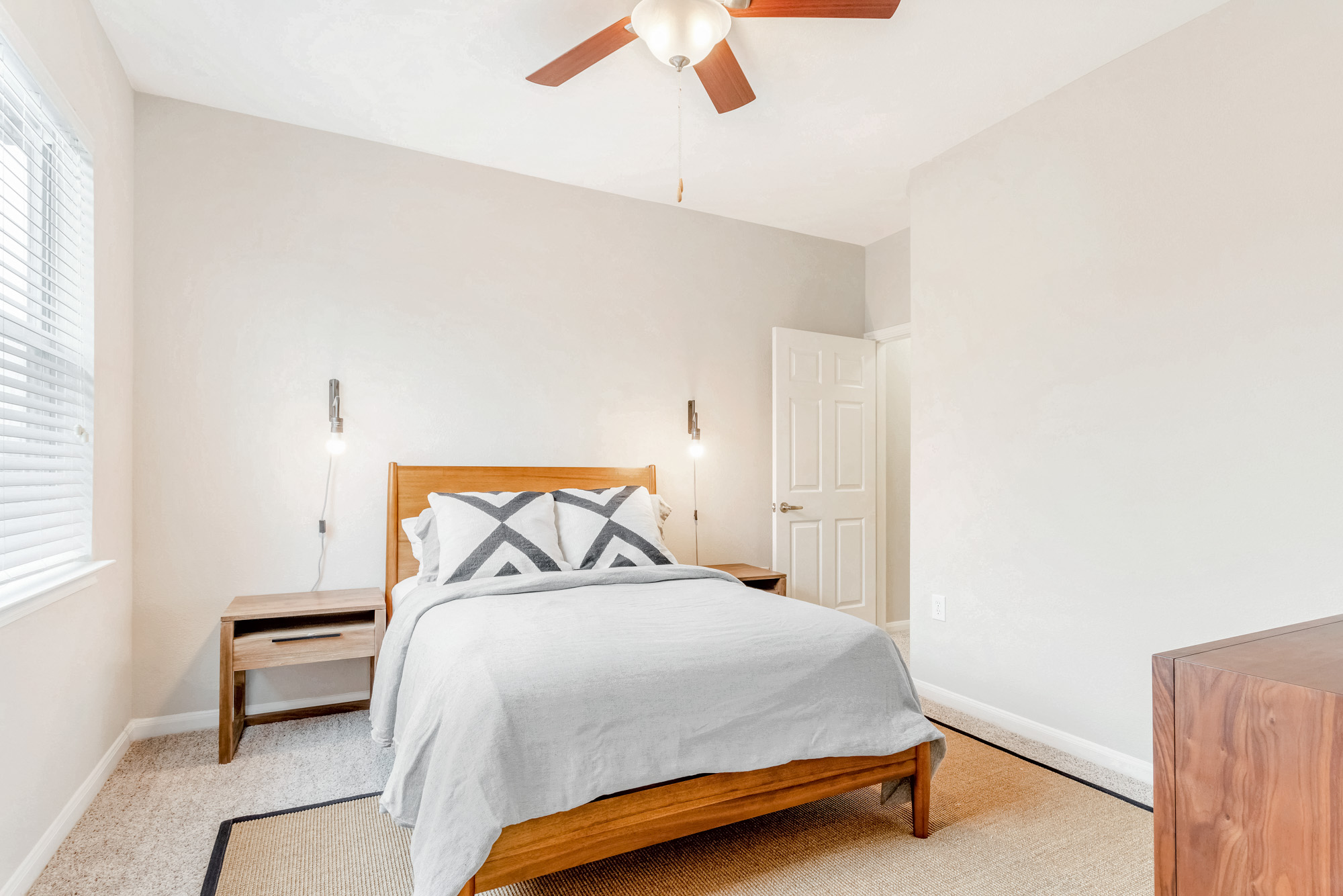 A bedroom at The Villas at Shadow Creek apartments in Houston, TX.