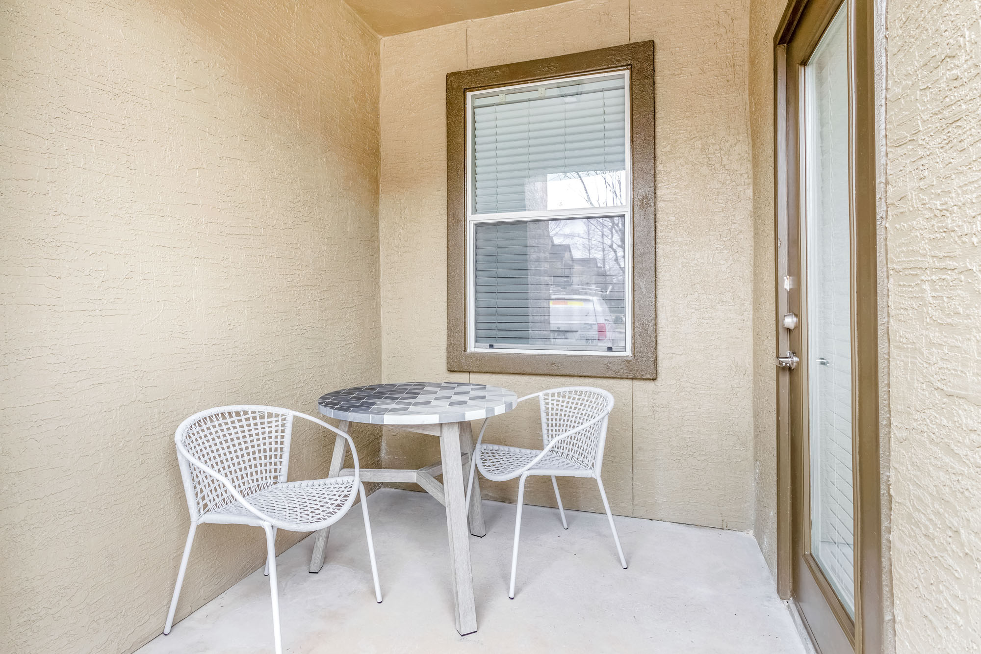 A balcony at The Villas at Shadow Creek apartments in Houston, TX.