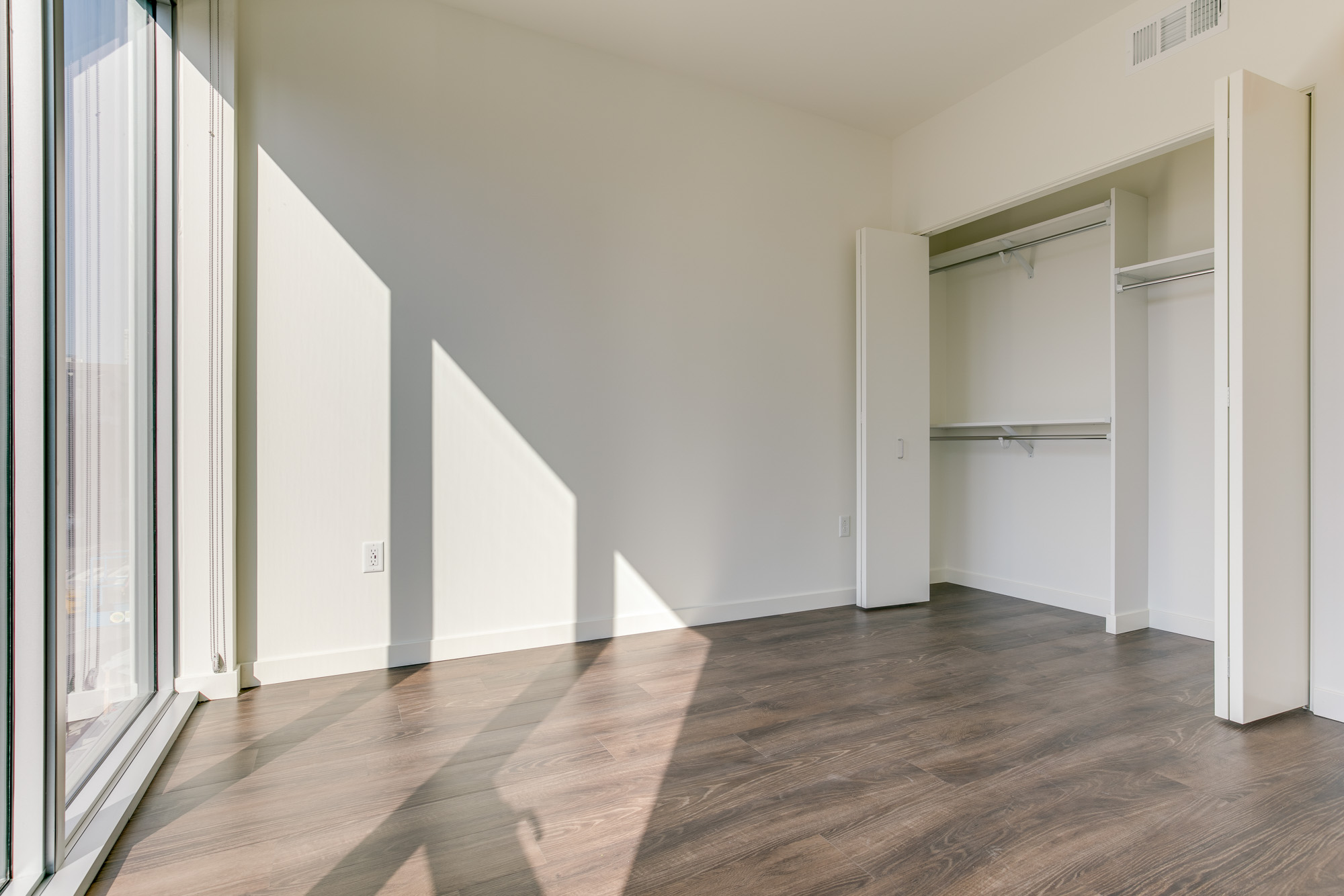 Bedroom space at The Merian Apartments in San Diego, California.