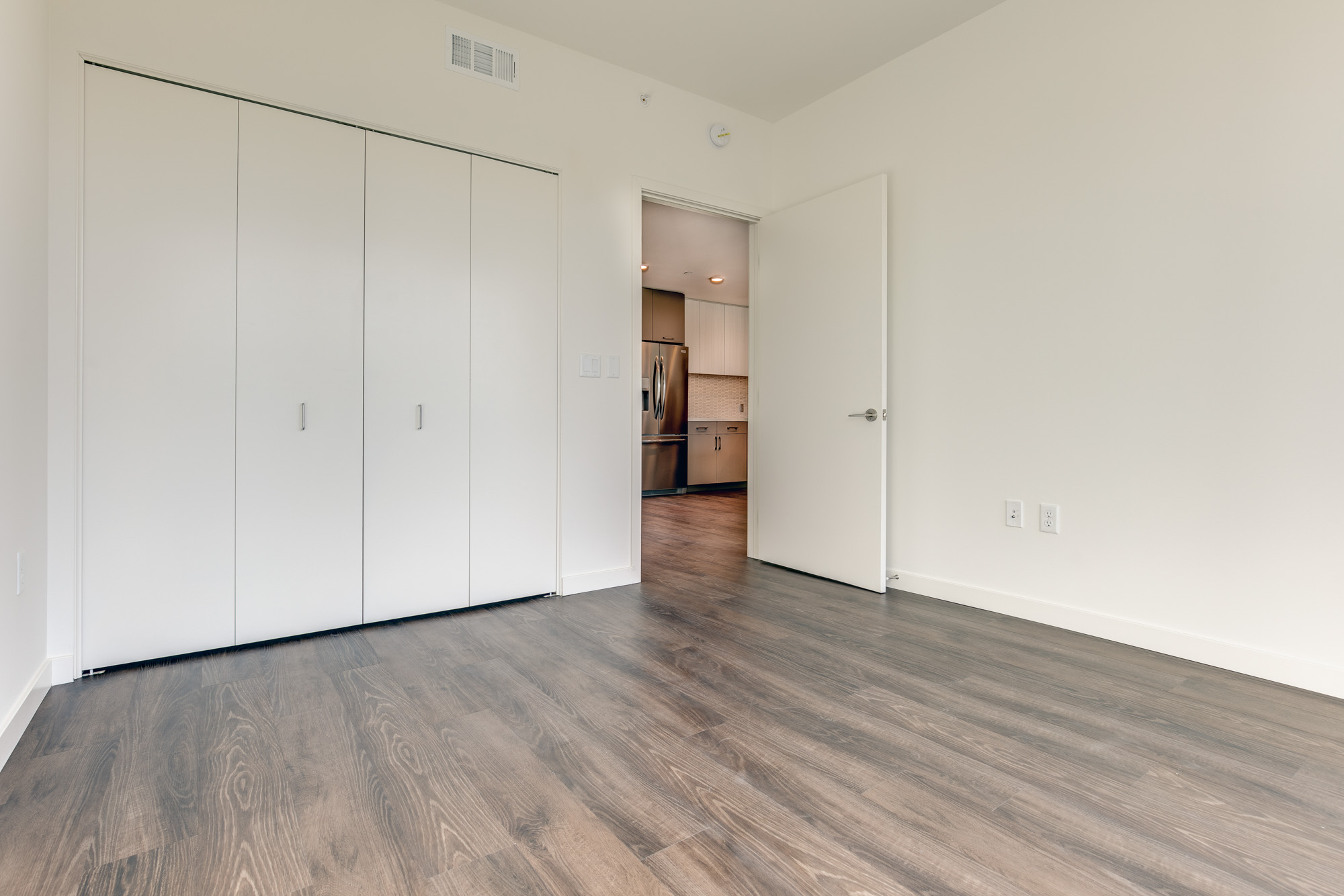 Bedroom space at The Merian Apartments in San Diego, California.