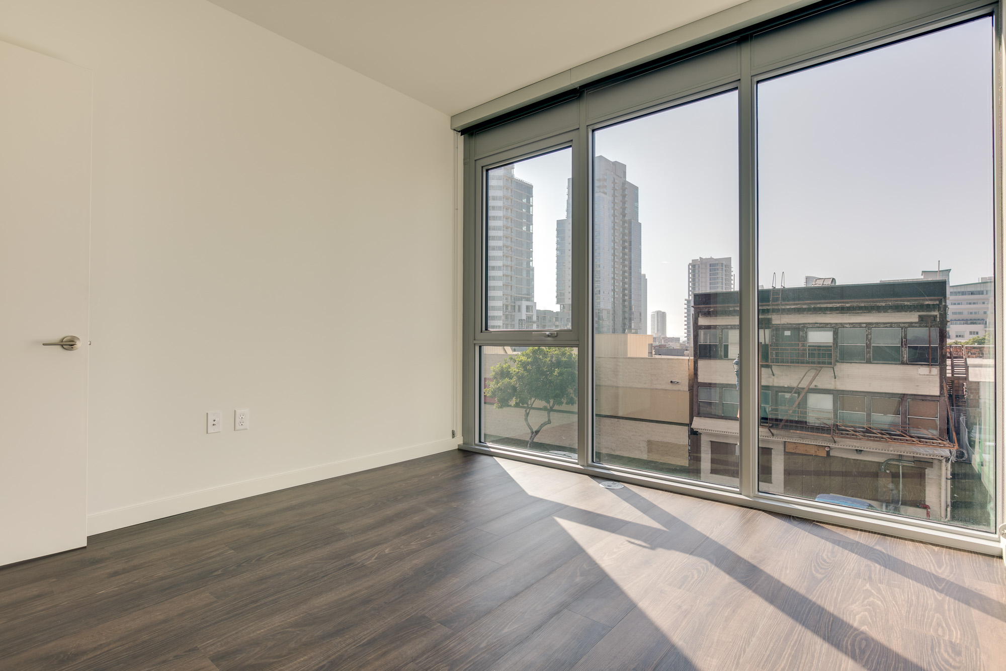 Bedroom space at The Merian Apartments in San Diego, California.