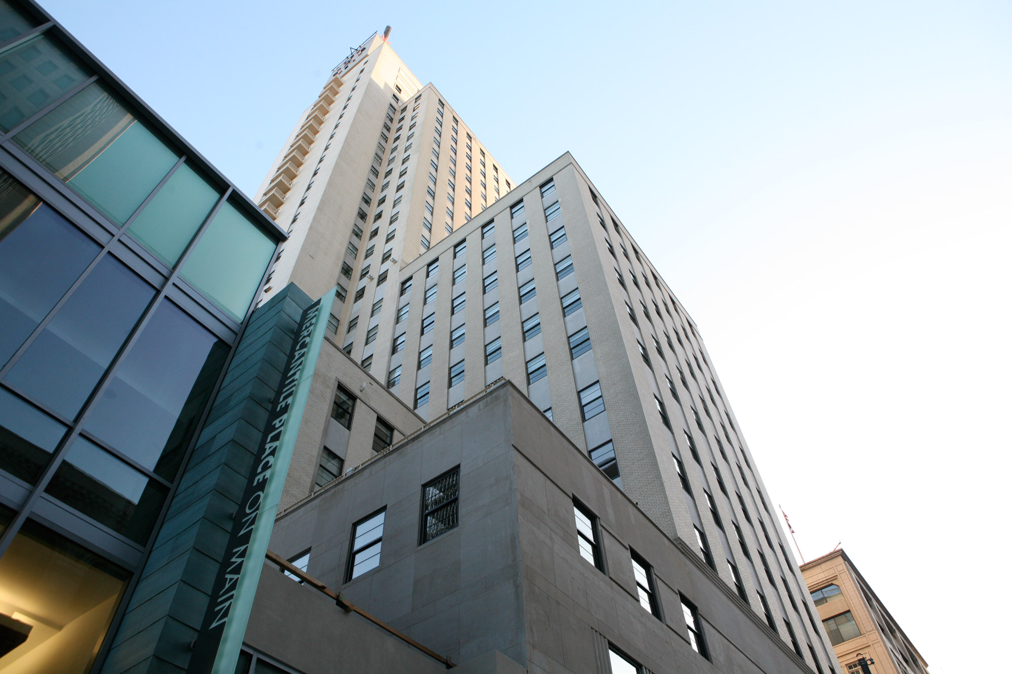 Vertical view of building at The Merc apartments in Mercantile Place in Dallas, TX