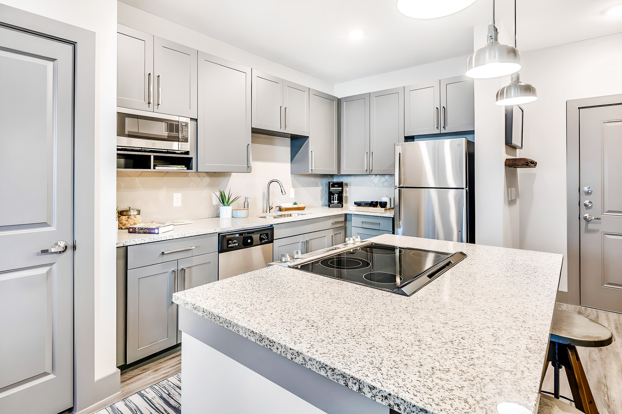 A kitchen at Embree Hill apartments in Dallas, TX