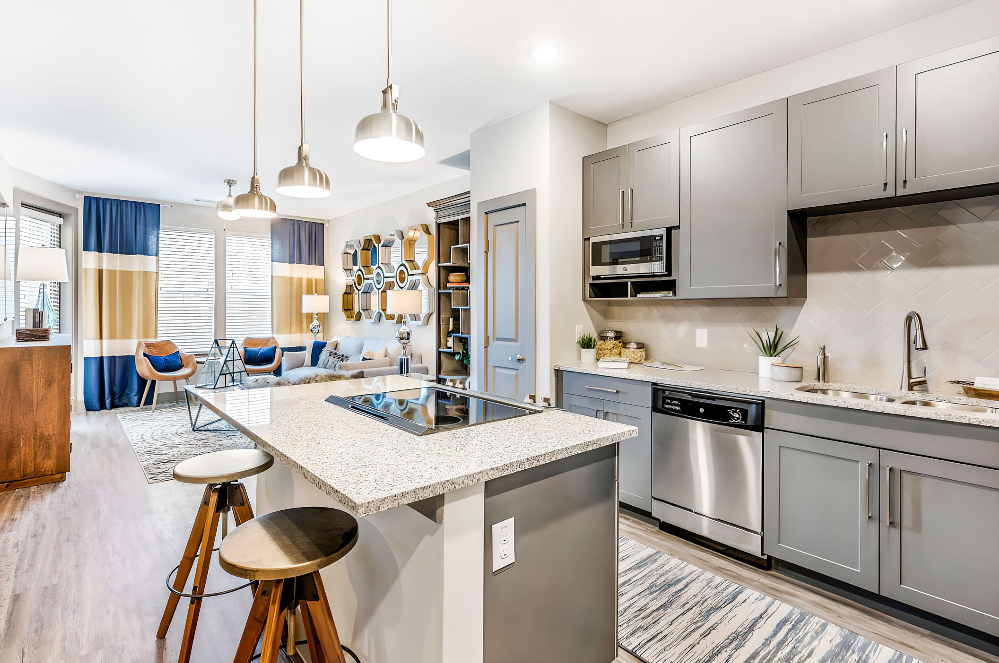 A kitchen at Embree Hill apartments in Dallas, TX