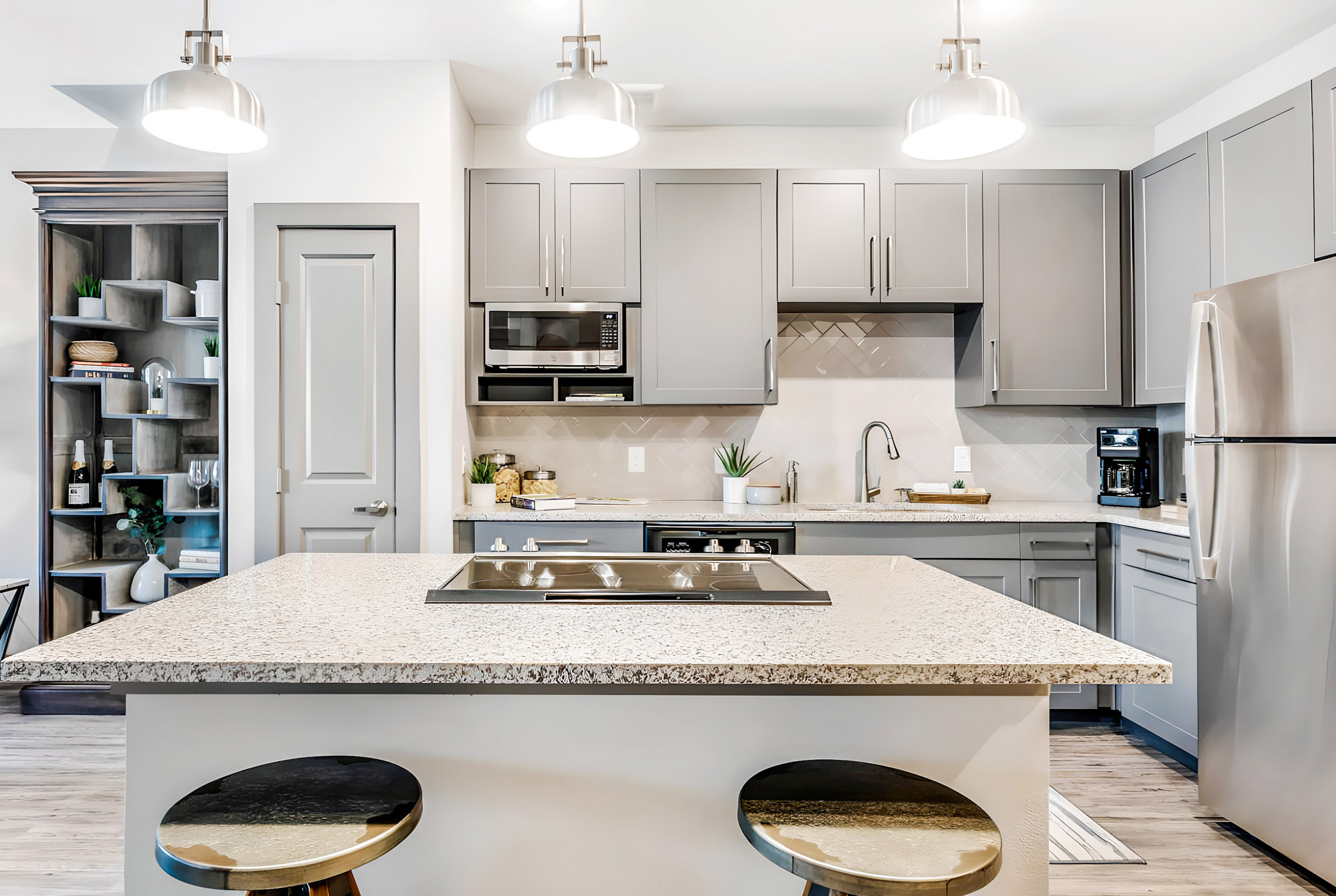 A kitchen at Embree Hill apartments in Dallas, TX