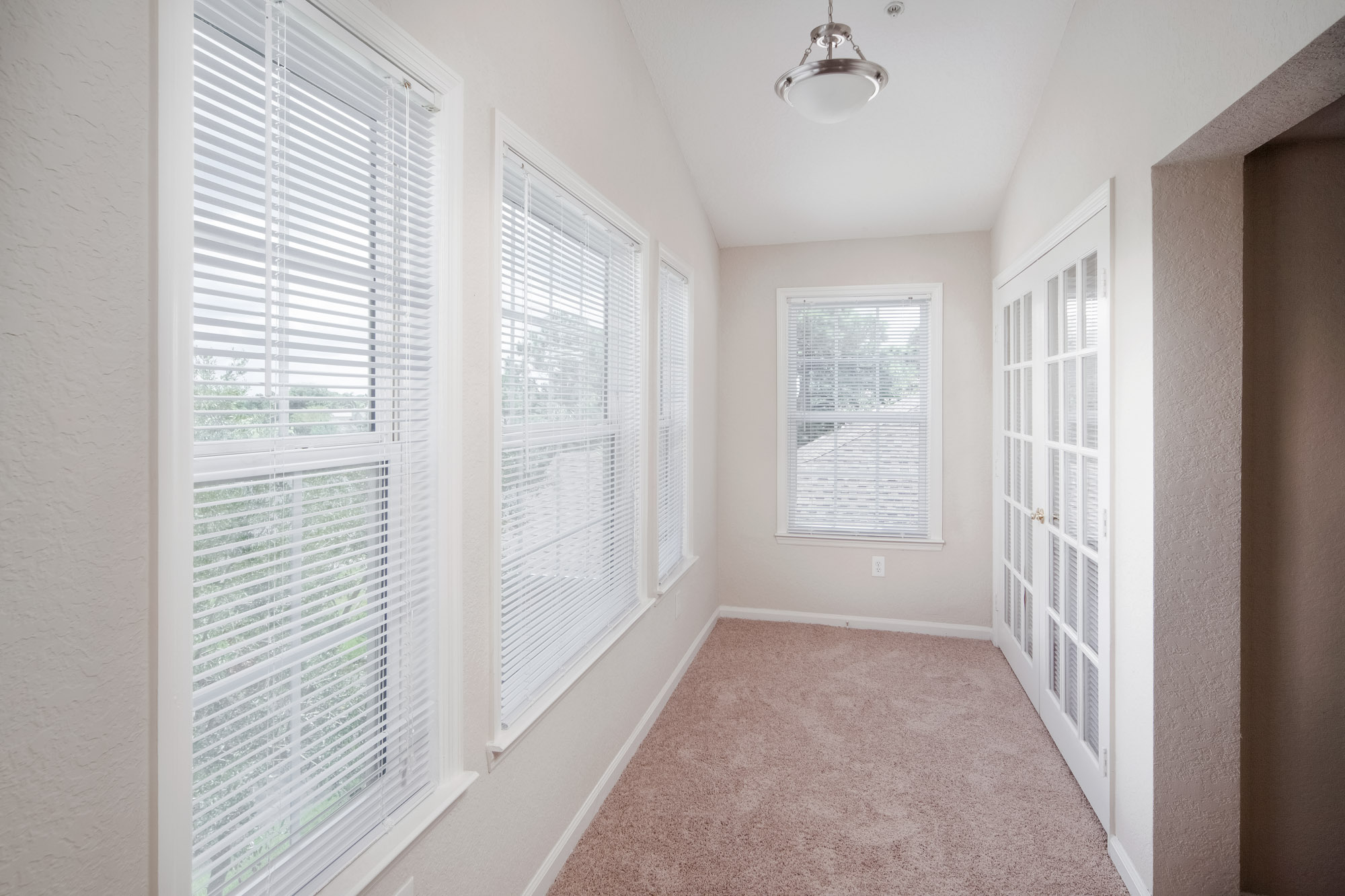 The hallway in an apartment at Osprey Links at Hunter's Creek in Orlando, Florida.