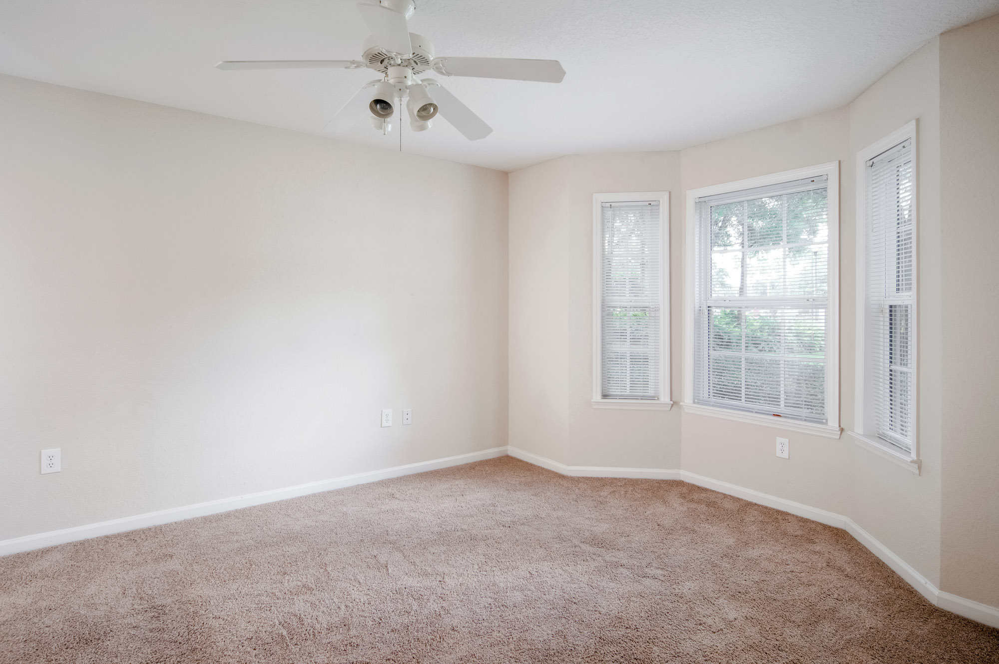 The bedroom in an apartment at Osprey Links at Hunter's Creek in Orlando, Florida.