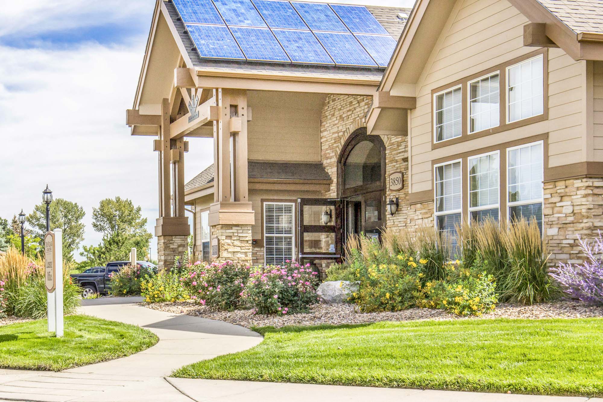 The clubhouse exterior at The Village at Legacy Ridge in Westminster, CO.