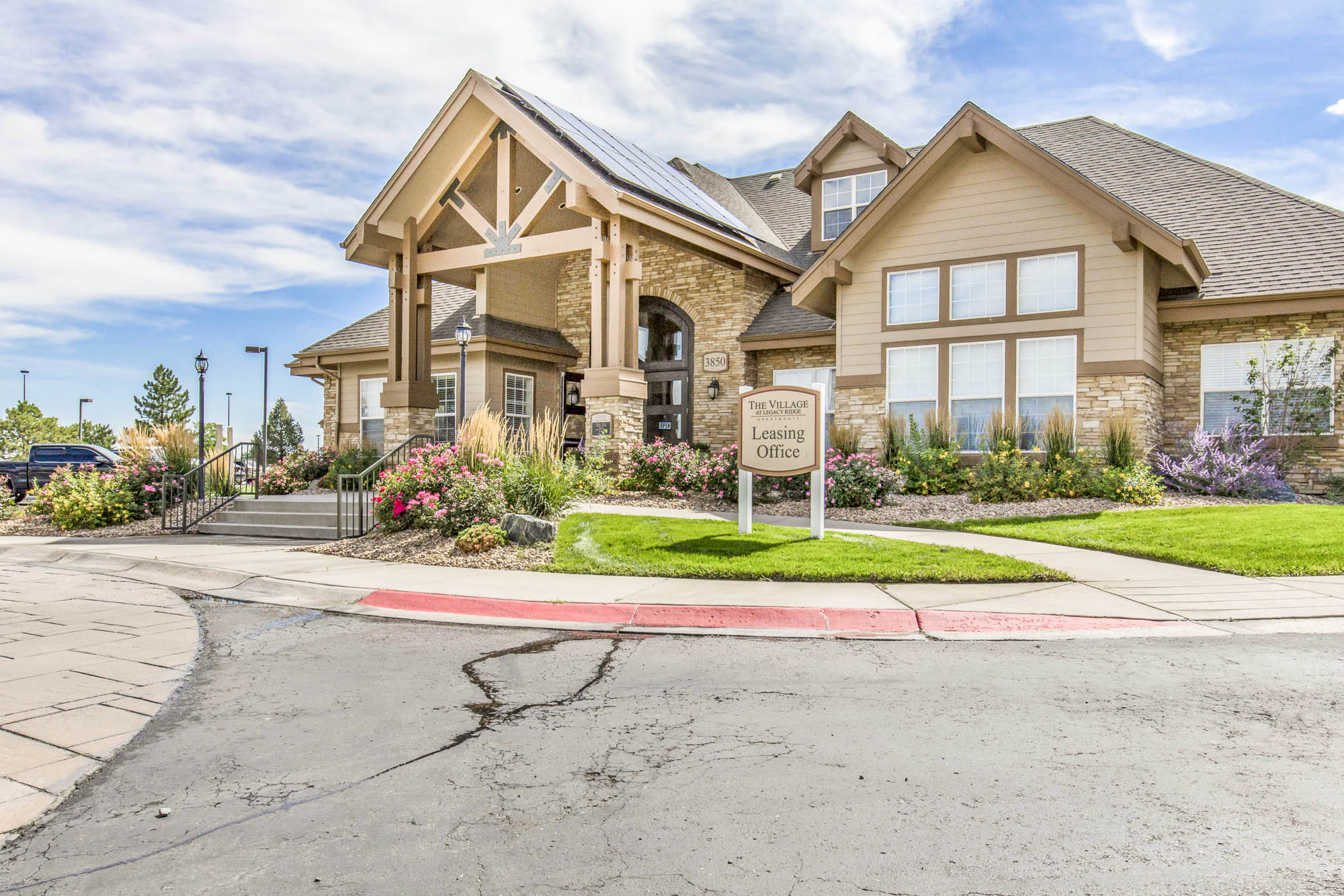 The clubhouse exterior at The Village at Legacy Ridge in Westminster, CO.