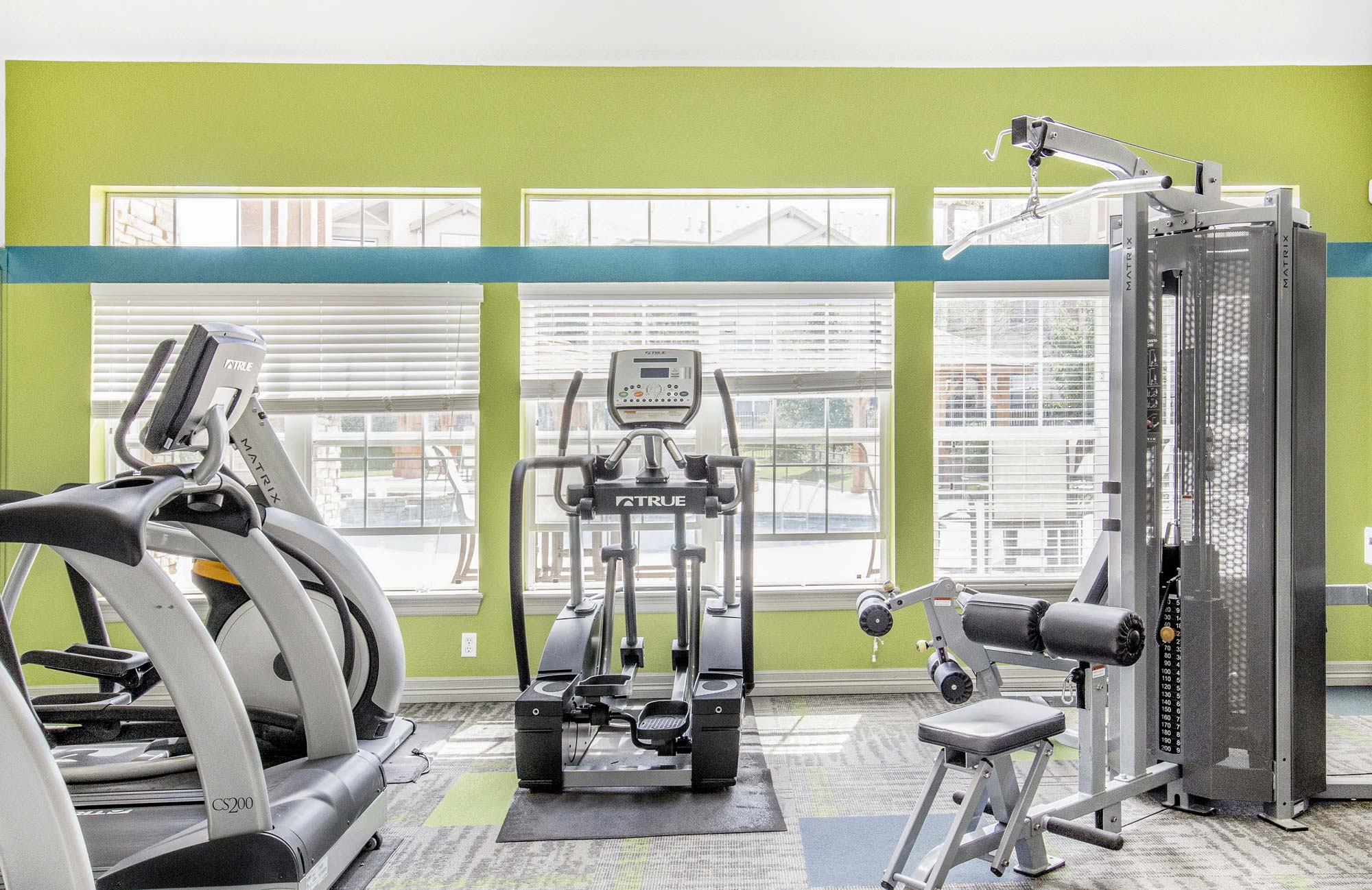 The fitness center at The Village at Legacy Ridge apartments in Westminster, CO.