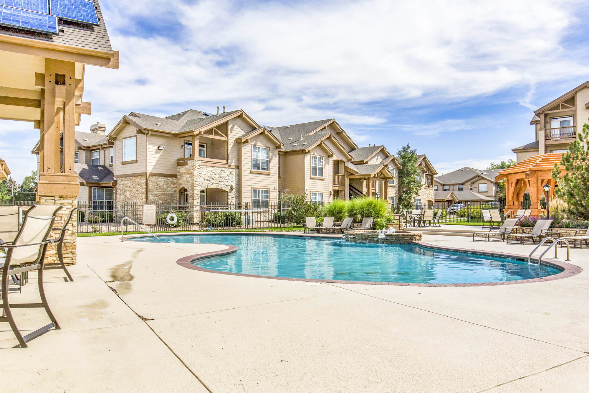 The pool at The Village at Legacy Ridge apartments near Denver, CO.