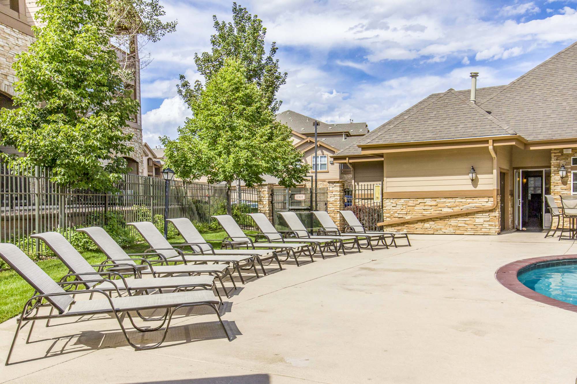 The pool at The Village at Legacy Ridge apartments near Denver, CO.