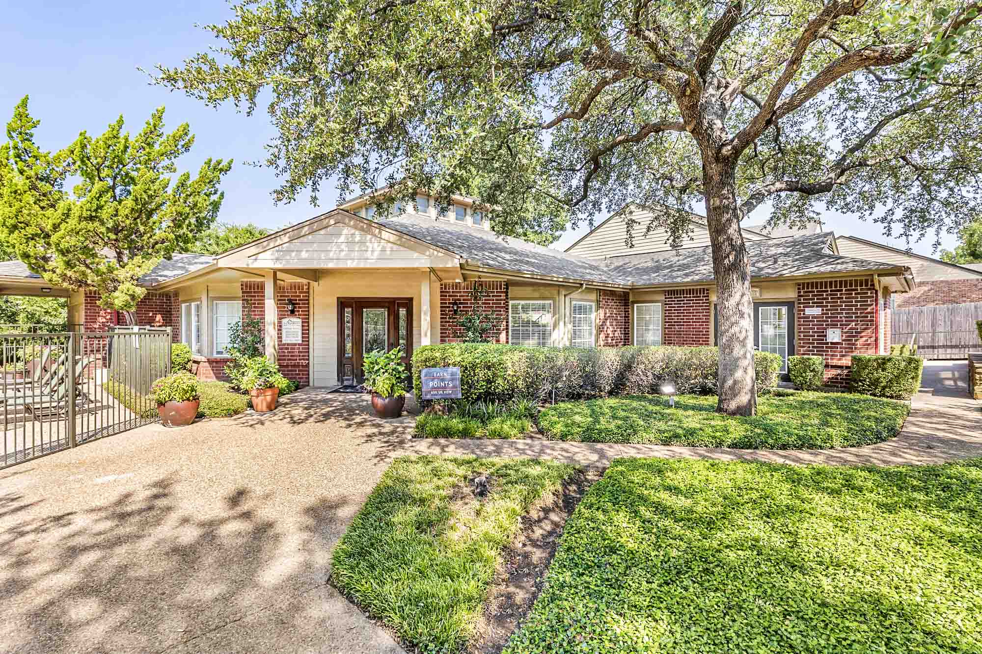 The exterior of the clubhouse at The Gables of McKinney apartments near Dallas, Texas.