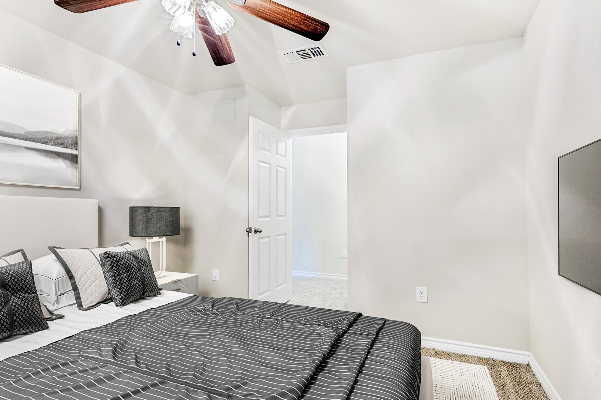 The bedroom in an apartment at The Gables of McKinney in McKinney, TX.