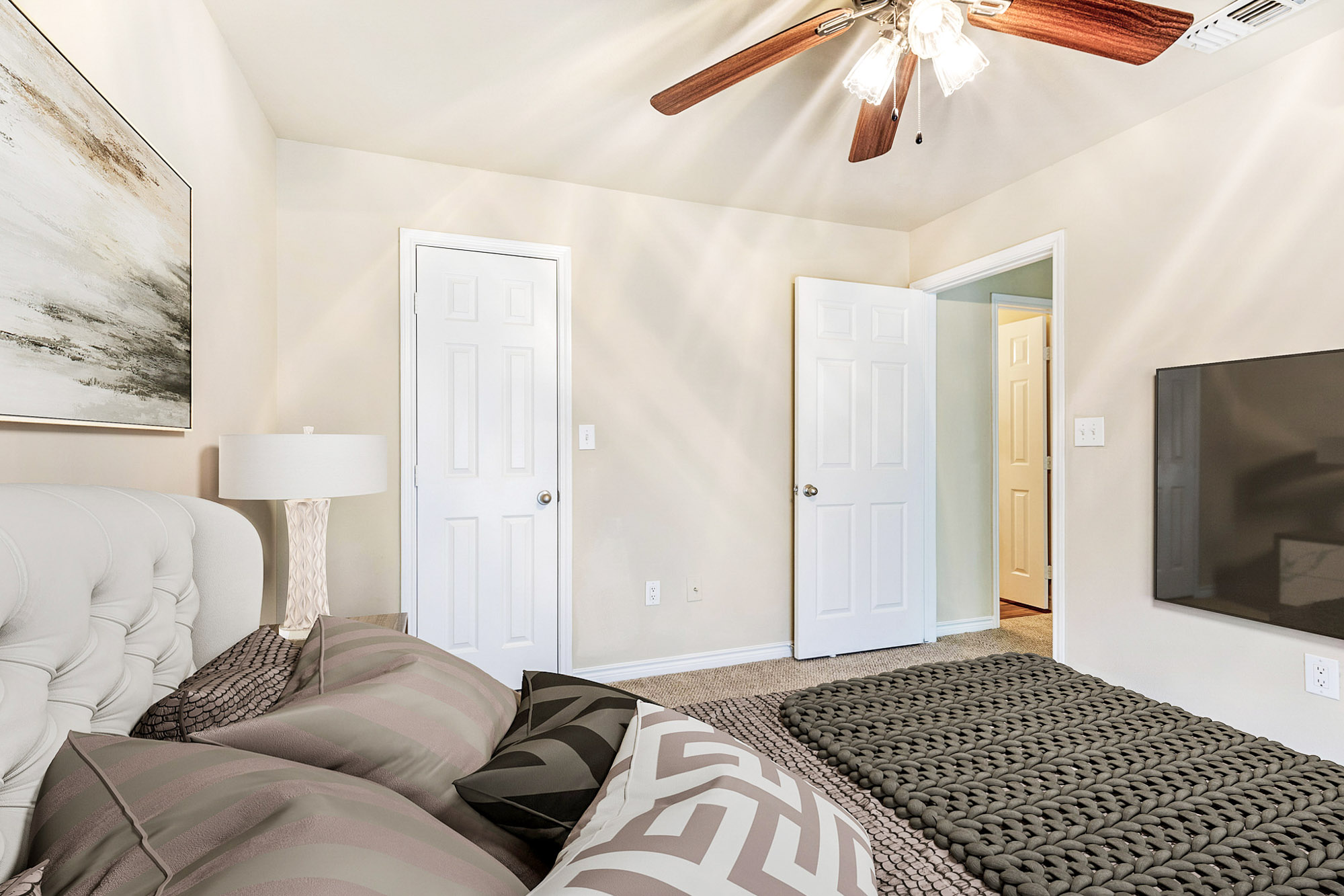 The bedroom in an apartment at The Gables of McKinney in McKinney, TX.