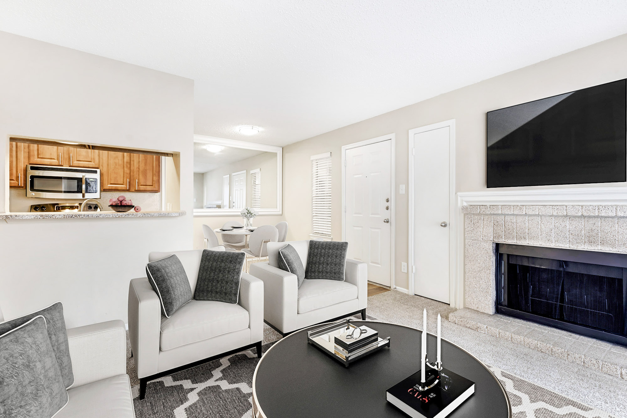 The living area in an apartment at The Gables of McKinney in McKinney, TX.