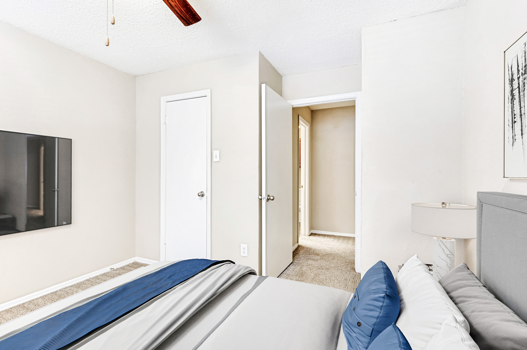 The bedroom in an apartment at The Gables of McKinney in McKinney, TX.