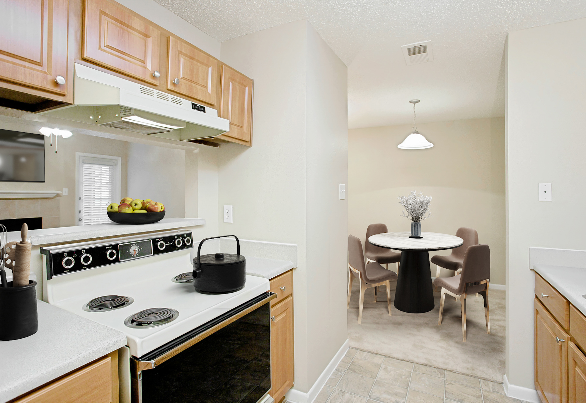 The kitchen of an apartment at The Arbors of Wells Branch in Austin, TX.